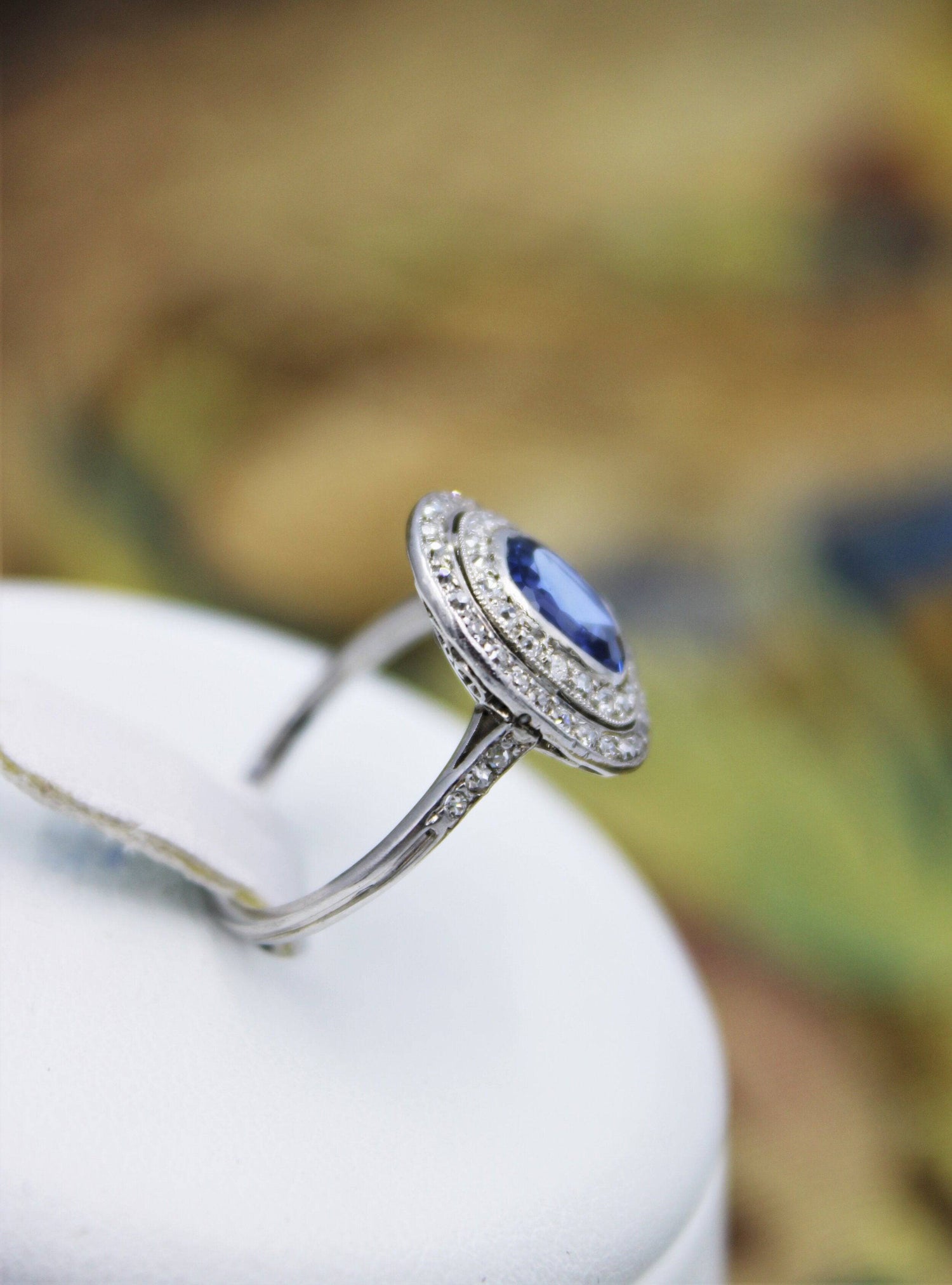 A fine Platinum Oval Ceylon Sapphire & Double Diamond Cluster Ring, Circa 1940. - Robin Haydock Antiques