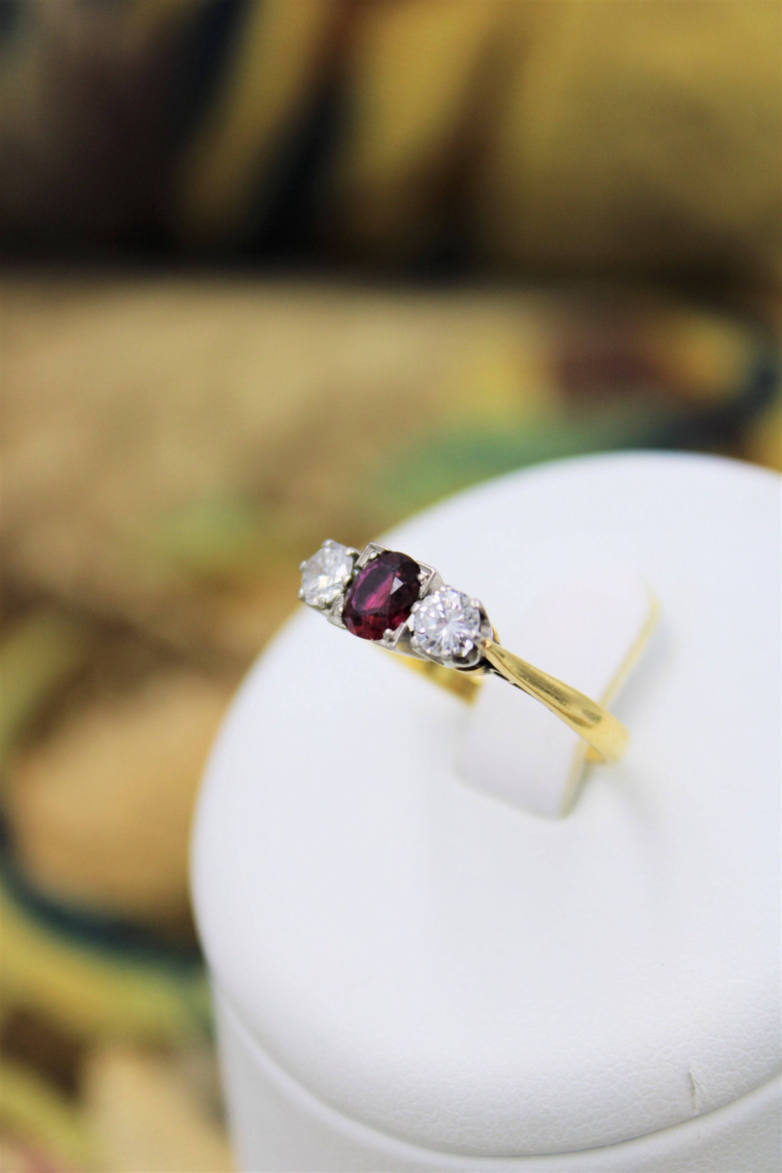 A very fine Three Stone Ruby & Diamond Ring mounted in 18ct Yellow Gol ...