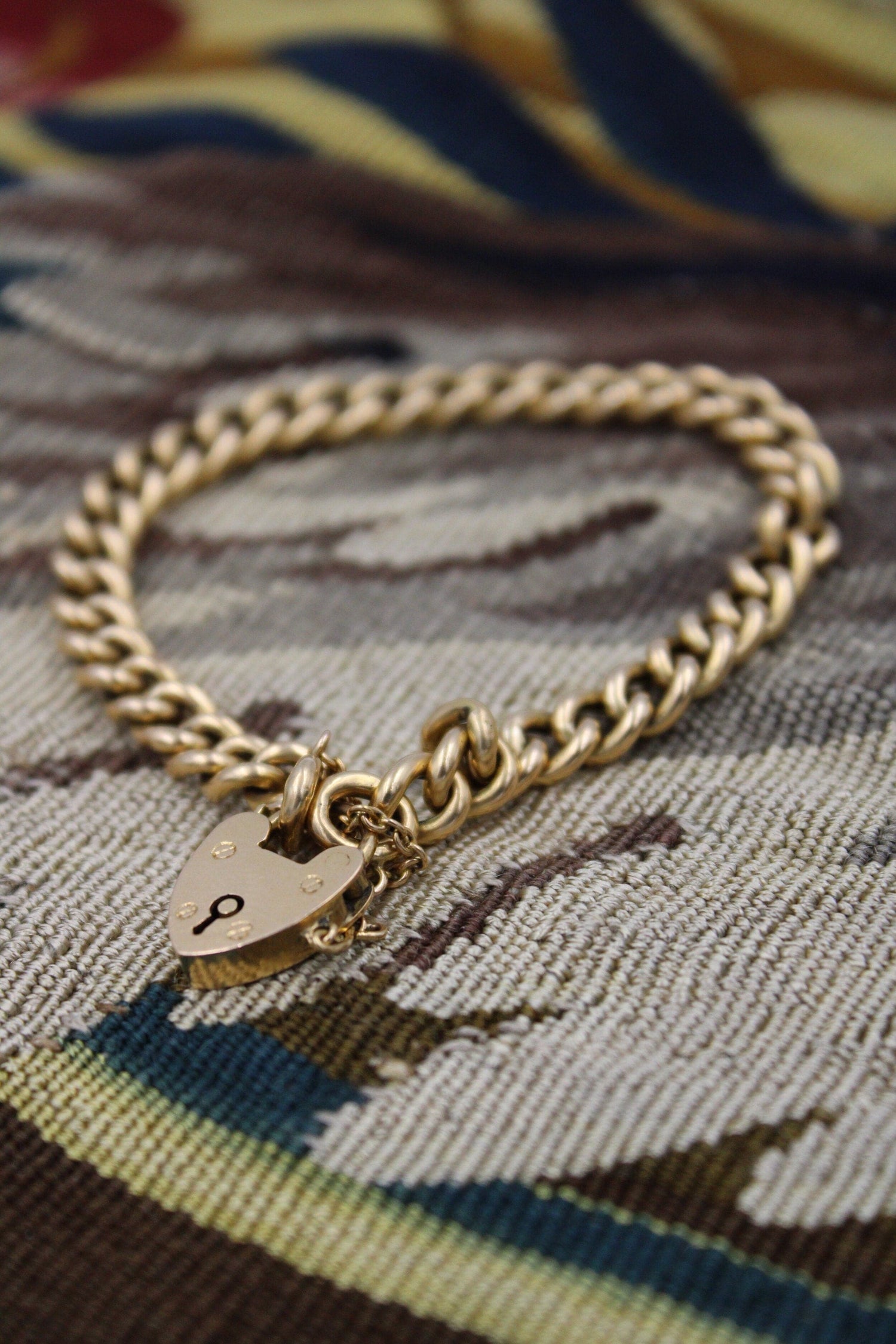 A very fine 18 Carat Yellow Gold (marked) Curb Link Bracelet with a Heart Shaped Padlock Closure, English, Circa 1890 - Robin Haydock Antiques