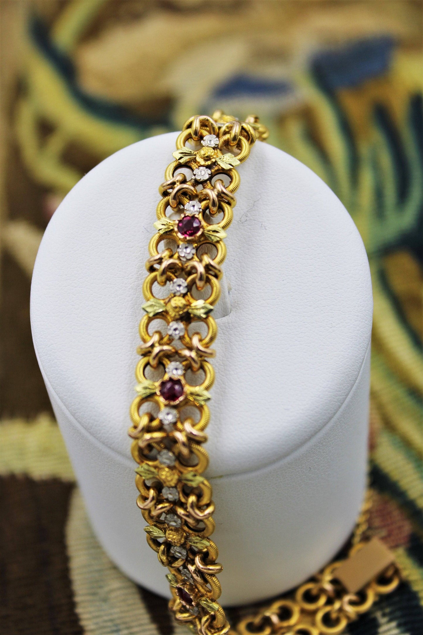 A very fine 18 Carat Green, Yellow and Pink Gold (French marked) Ruby set bracelet, French, Circa 1935 - Robin Haydock Antiques