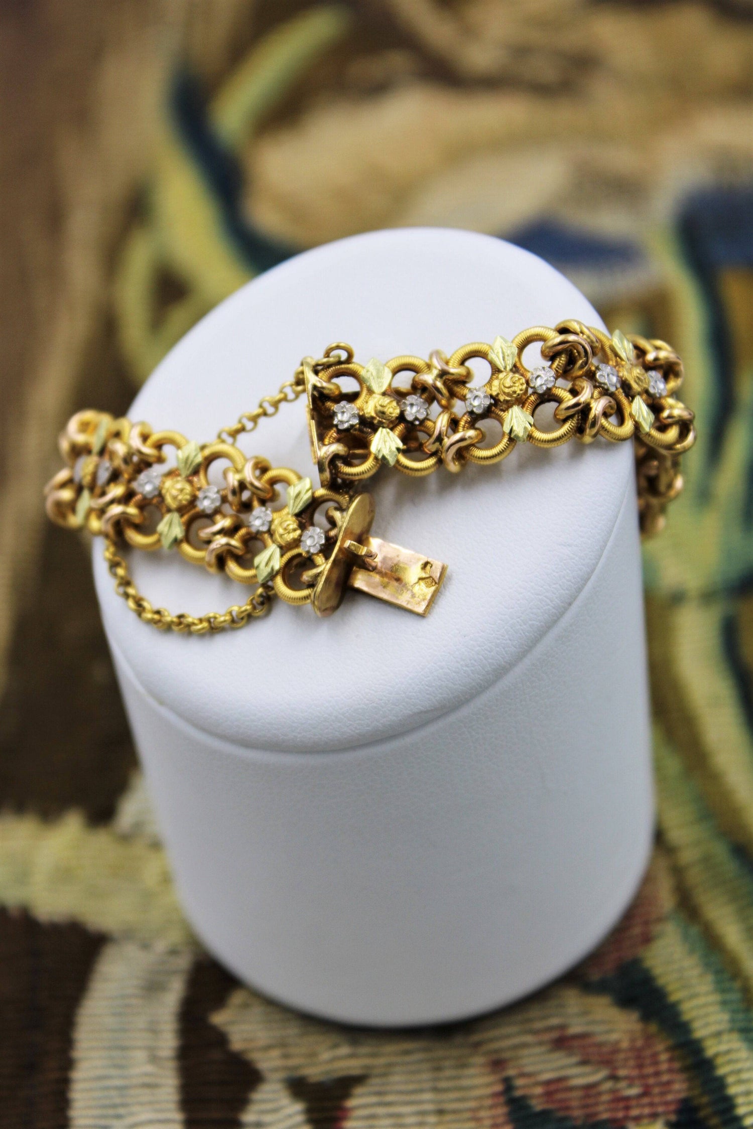 A very fine 18 Carat Green, Yellow and Pink Gold (French marked) Ruby set bracelet, French, Circa 1935 - Robin Haydock Antiques
