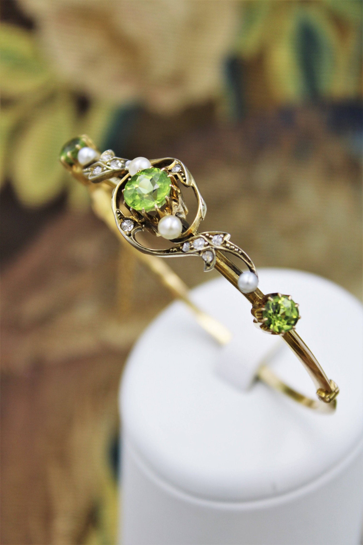 A very fine Peridot, Diamond and Natural Pearl Bangle mounted in 15ct Yellow Gold, English, Circa 1905 - Robin Haydock Antiques
