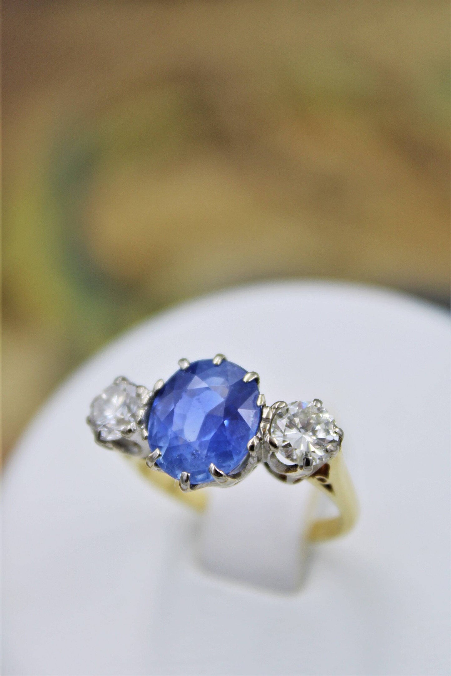 A fine Sapphire & Diamond Three Stone Ring mounted in 18 Carat Yellow Gold & Platinum (stamped), Circa 1960 - Robin Haydock Antiques