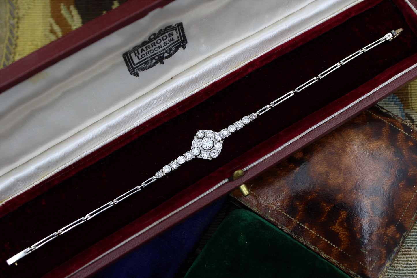 A very fine Edwardian Diamond Demi-Bracelet set in 18ct Gold and Platinum tipped, English, Circa 1910