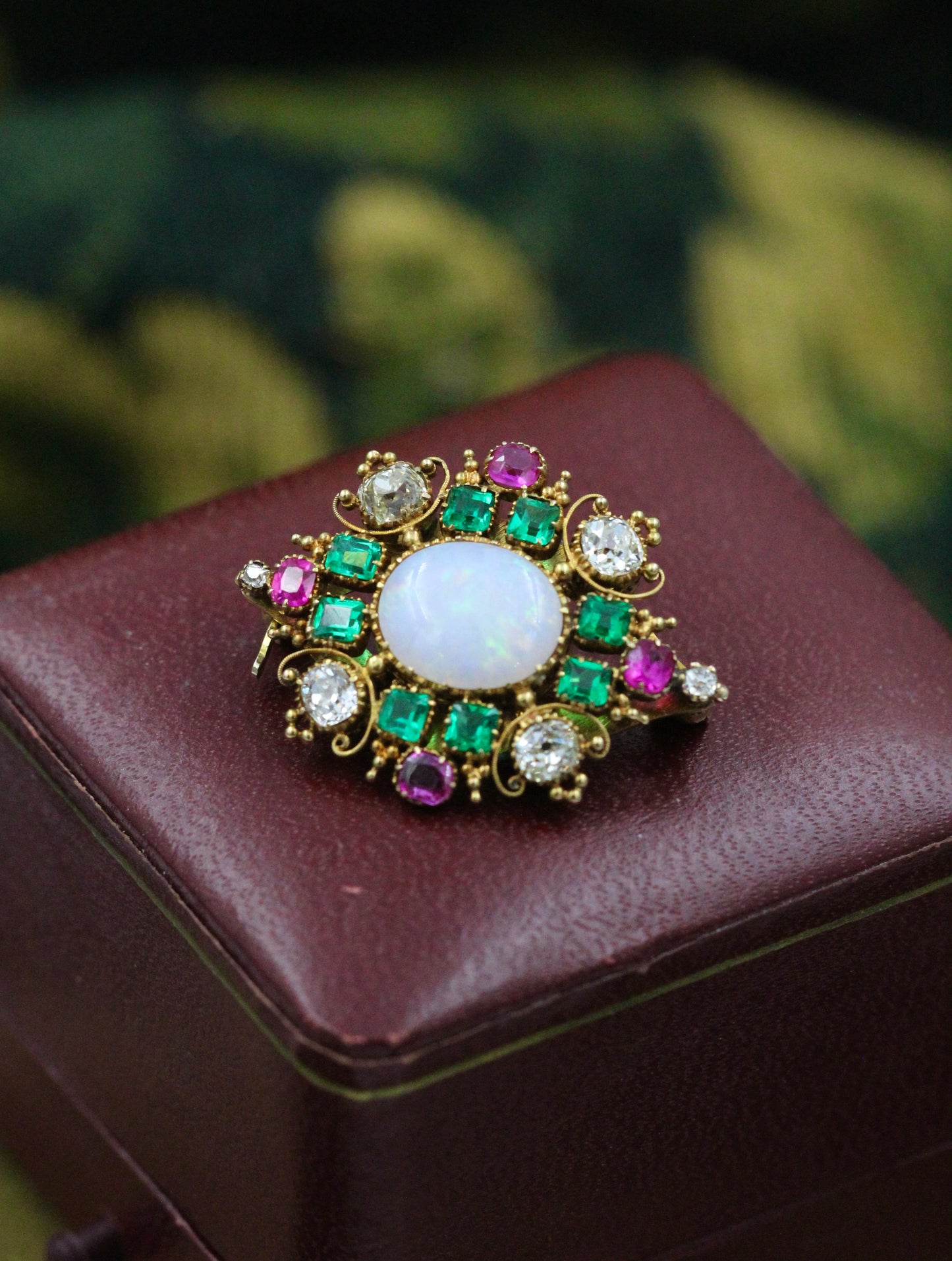 A very finely worked Opal, Colombian Emerald, Burmese Ruby & Diamond, 18ct Yellow Gold Brooch, attributed to Harvey & Gore. Circa 1890. - Robin Haydock Antiques