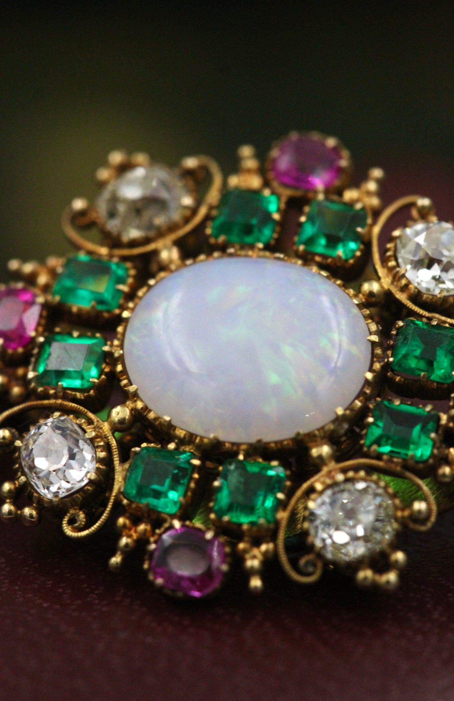 A very finely worked Opal, Colombian Emerald, Burmese Ruby & Diamond, 18ct Yellow Gold Brooch, attributed to Harvey & Gore. Circa 1890. - Robin Haydock Antiques