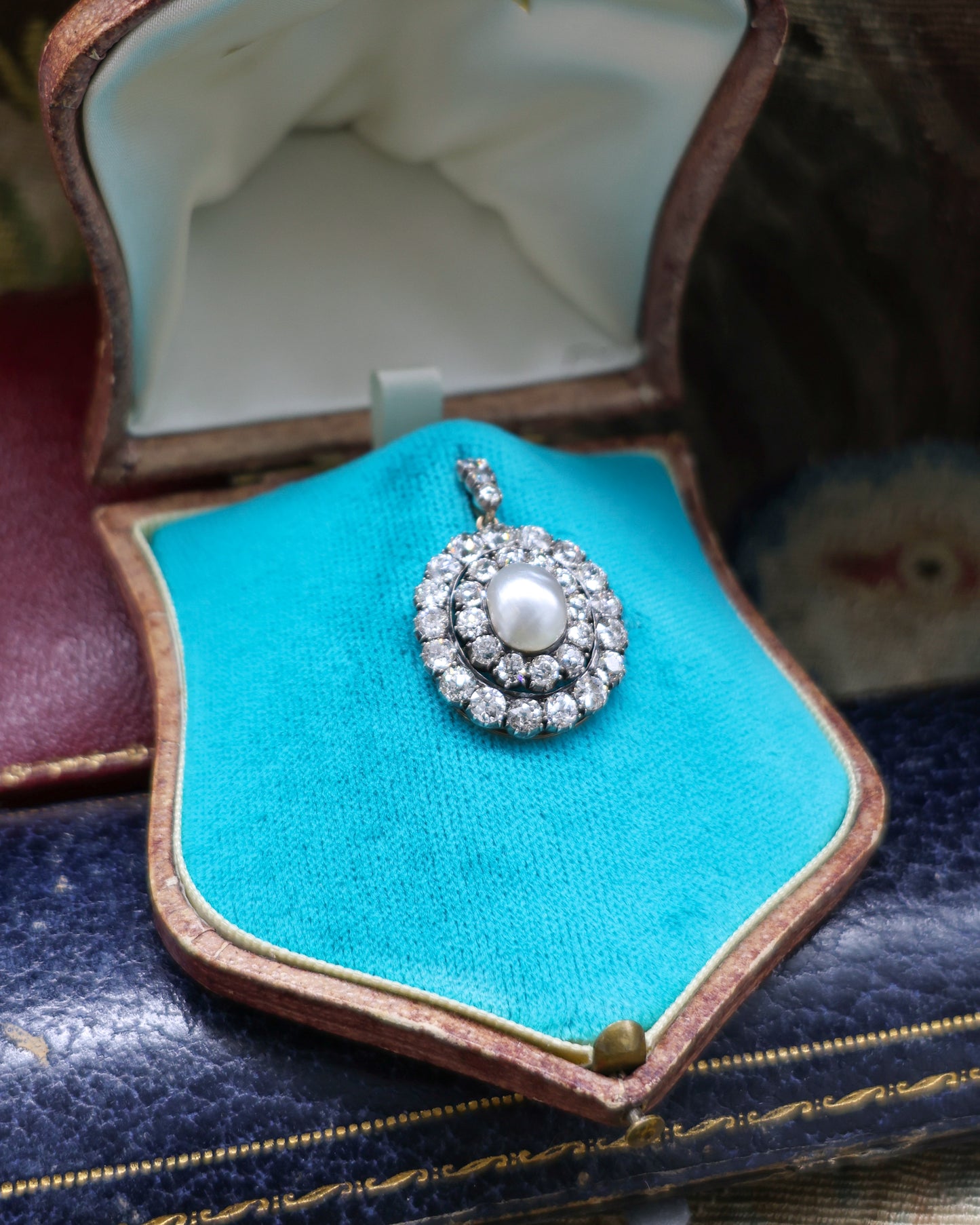 A very fine example of a Natural Pteriidae Oval Pearl and Diamond Pendant - Brooch. Victorian Circa 1890