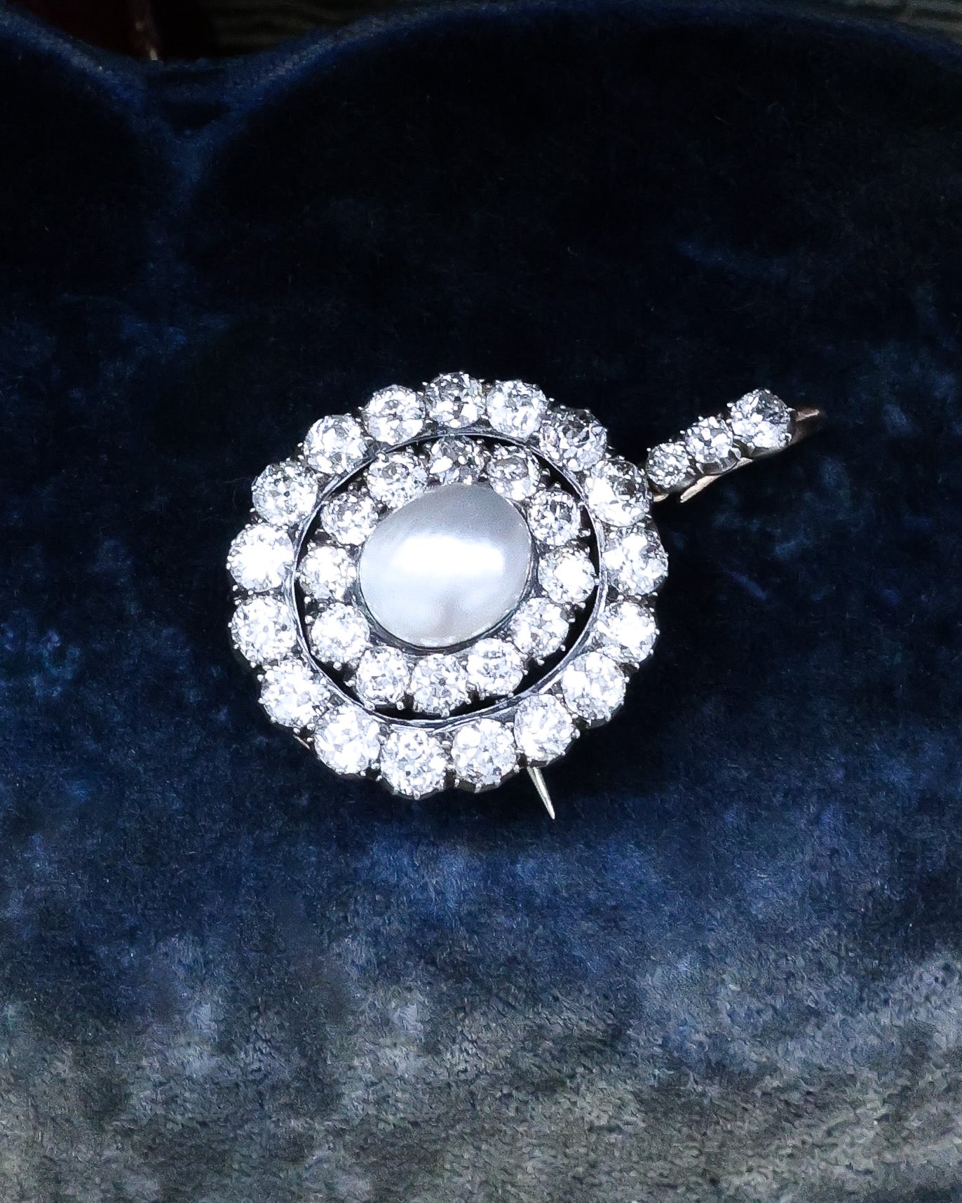 A very fine example of a Natural Pteriidae Oval Pearl and Diamond Pendant - Brooch. Victorian Circa 1890