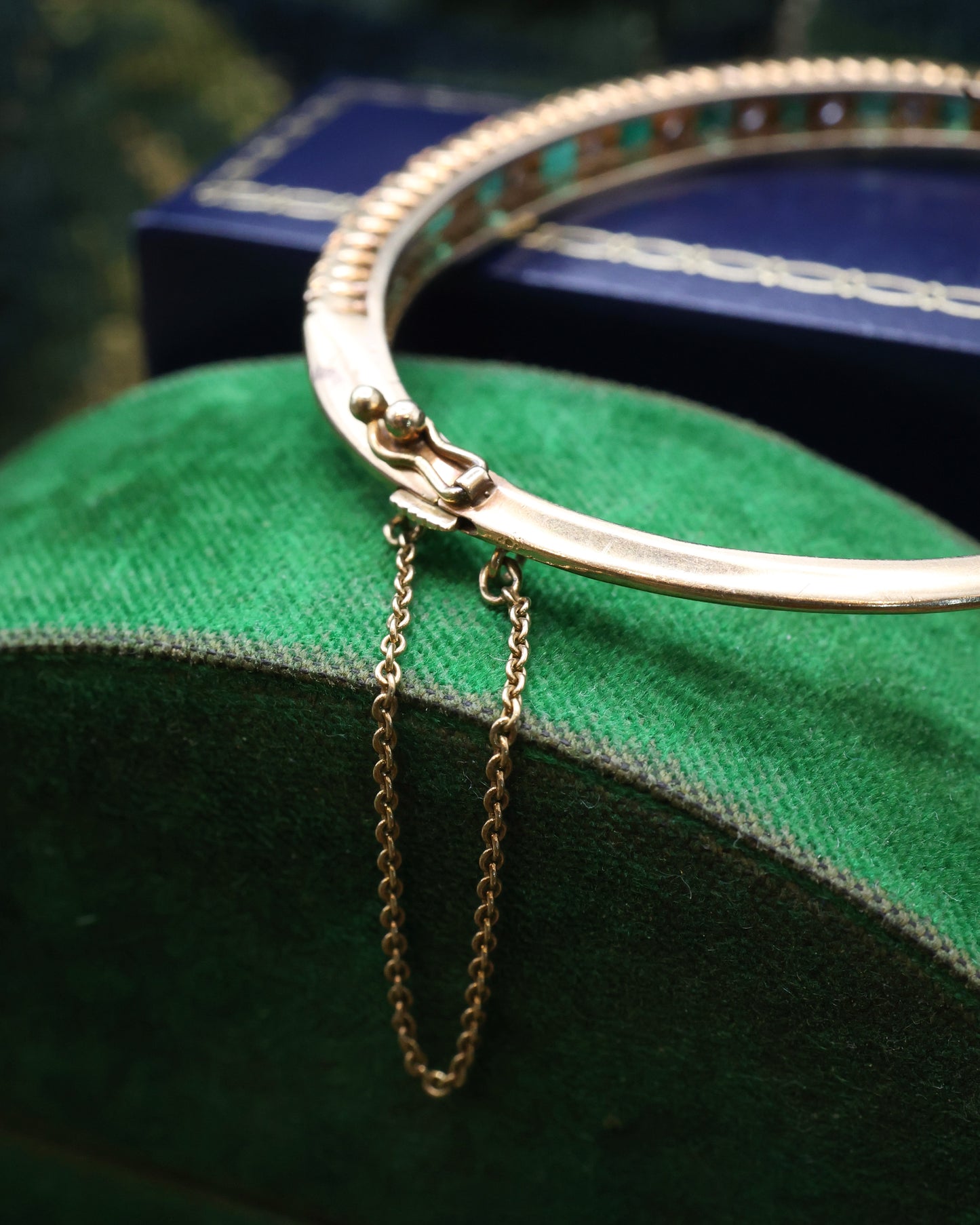 A very fine 15 ct Yellow Gold (tested), 2.20 Carat Colombian Emerald & Diamond Half Hinged Bangle. English Circa 1900.