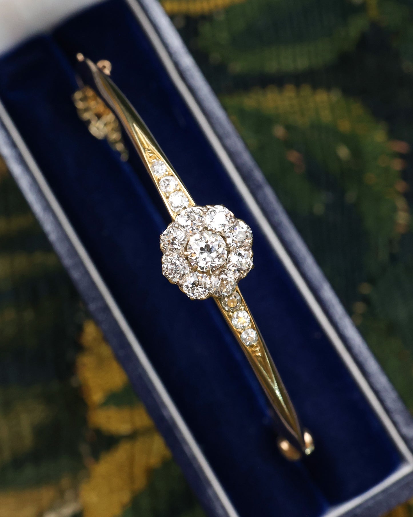 A very fine 18 carat Yellow Gold (tested), Diamond Cluster Bangle Circa 1890.