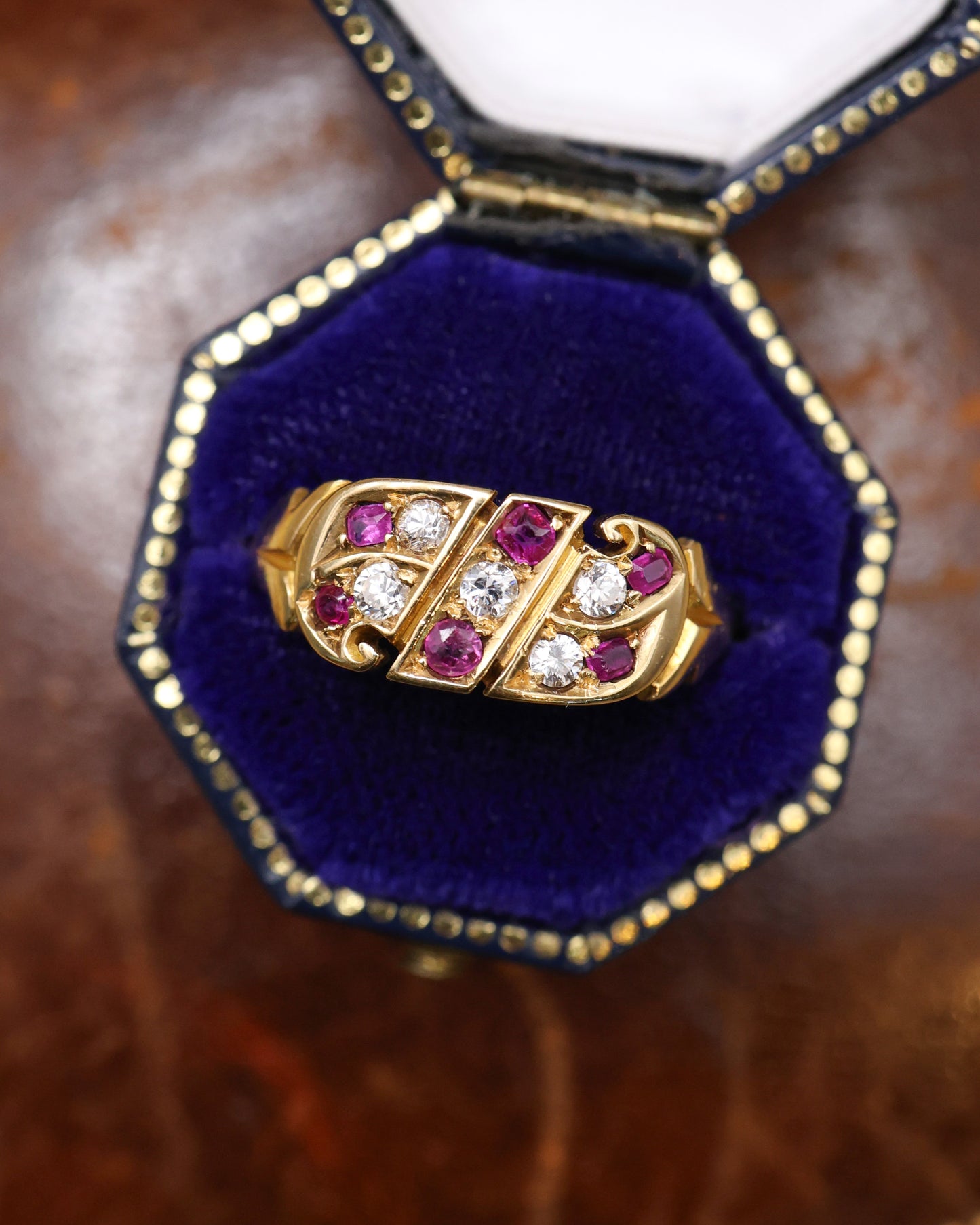 A fine example of a Chester Hallmarked 18ct Yellow Gold, Victorian Ring set with Five Old Cut Diamonds and Six Rubies. .  English  Circa 1899