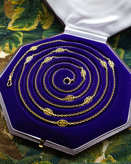 A very heavy 18 carat Yellow Gold Chain (tested), 65" Long Guard / Necklace, with eleven intermittent open lozenge designs, in the French style. 48.8 gr Circa 1890. - Robin Haydock Antique Jewellery