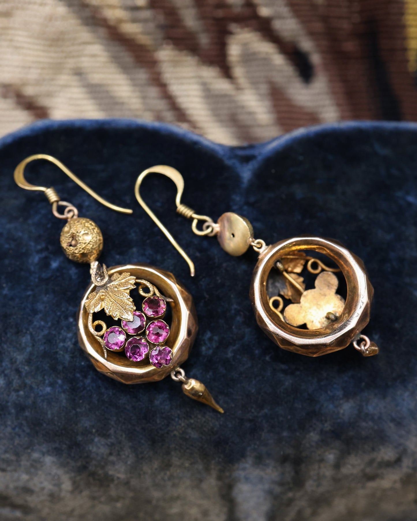 A beautiful pair of Late Victorian 9 Carat Yellow Gold (tested),  Almandine Garnet Drop Earrings with Etruscan Revival & Bacchanalian influences. English Circa 1880