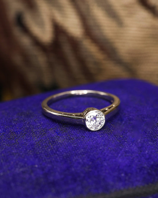 A  very fine 14 ct White Gold  (marked) Diamond Solitaire Ring, centrally "Rub Over Set" with one "Old Round Cut" Diamond of approximately 0.30 Carats. Circa 1960 - Robin Haydock Antique Jewellery