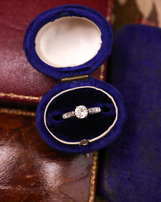 A very fine Platinum (marked) Diamond Solitaire Ring, centrally "Raised Claw Set" with one "Old Round Cut" Diamond of approximately 0.35 Carats. Circa 1925 - Robin Haydock Antique Jewellery