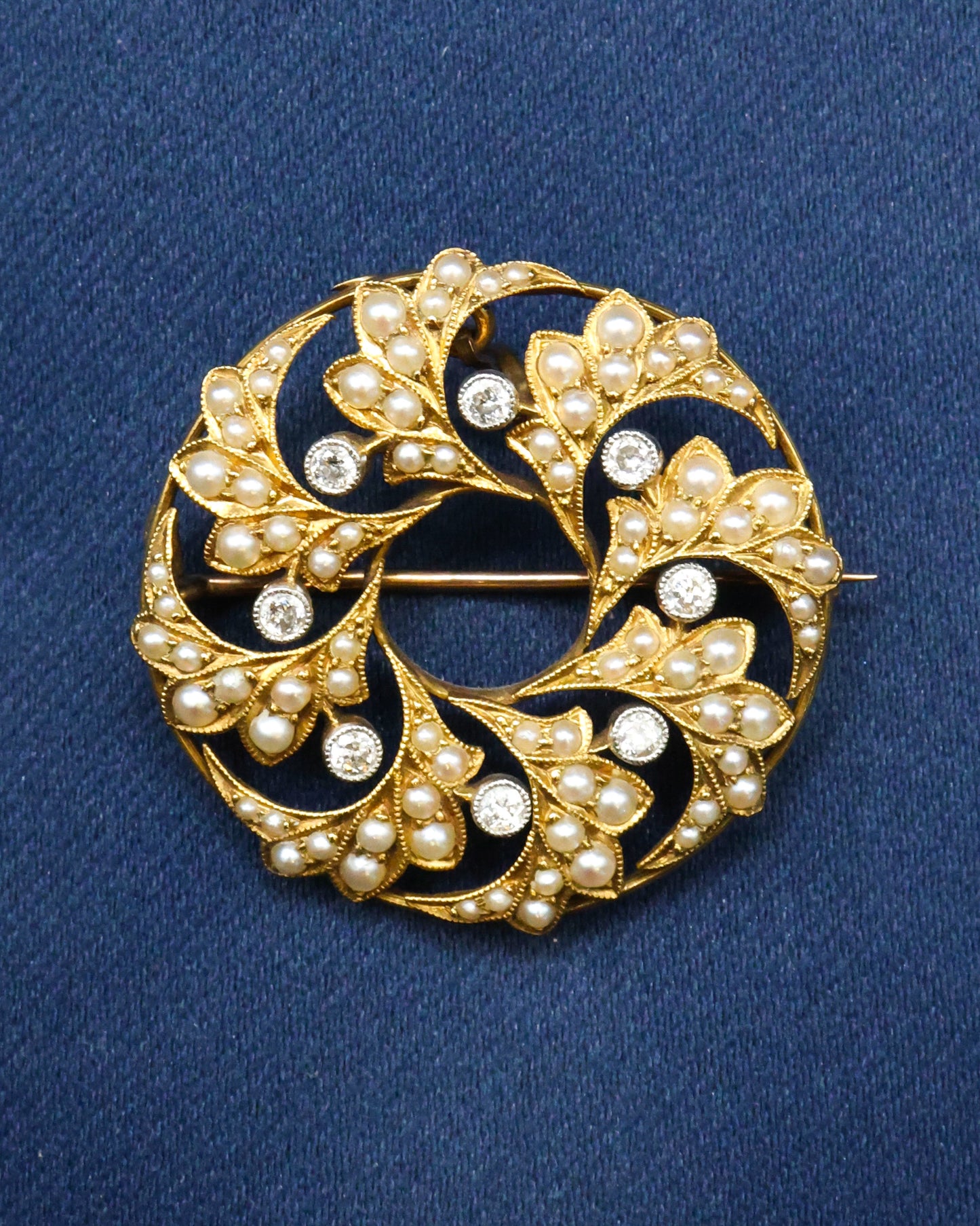 A 15ct. (stamped) Yellow Gold & Platinum Seed Pearl & Diamond Brooch with a Pendant fitting. Circa 1880