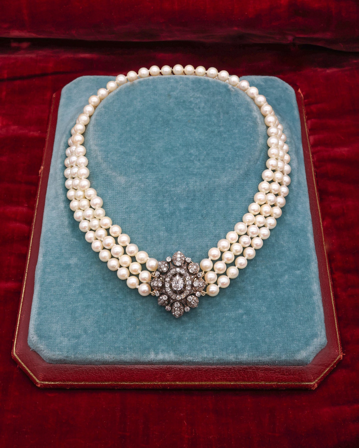 A very fine High Carat (tested), Yellow Gold, Silver tipped Oval Diamond Clasp, with double receipt fasteners for a triple row necklace of Cultured Pearls