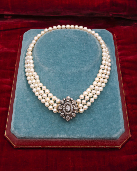 A very fine High Carat (tested), Yellow Gold, Silver tipped Oval Diamond Clasp, with double receipt fasteners for a triple row necklace of Cultured Pearls