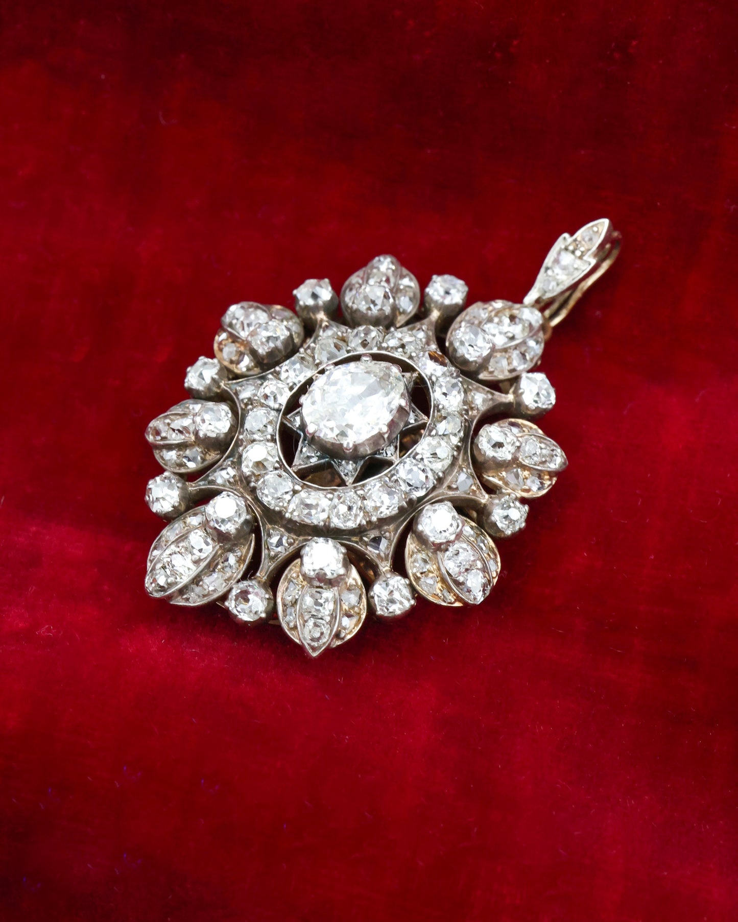 A very fine High Carat (tested), Yellow Gold, Silver tipped Oval Diamond Clasp, with double receipt fasteners for a triple row necklace of Cultured Pearls
