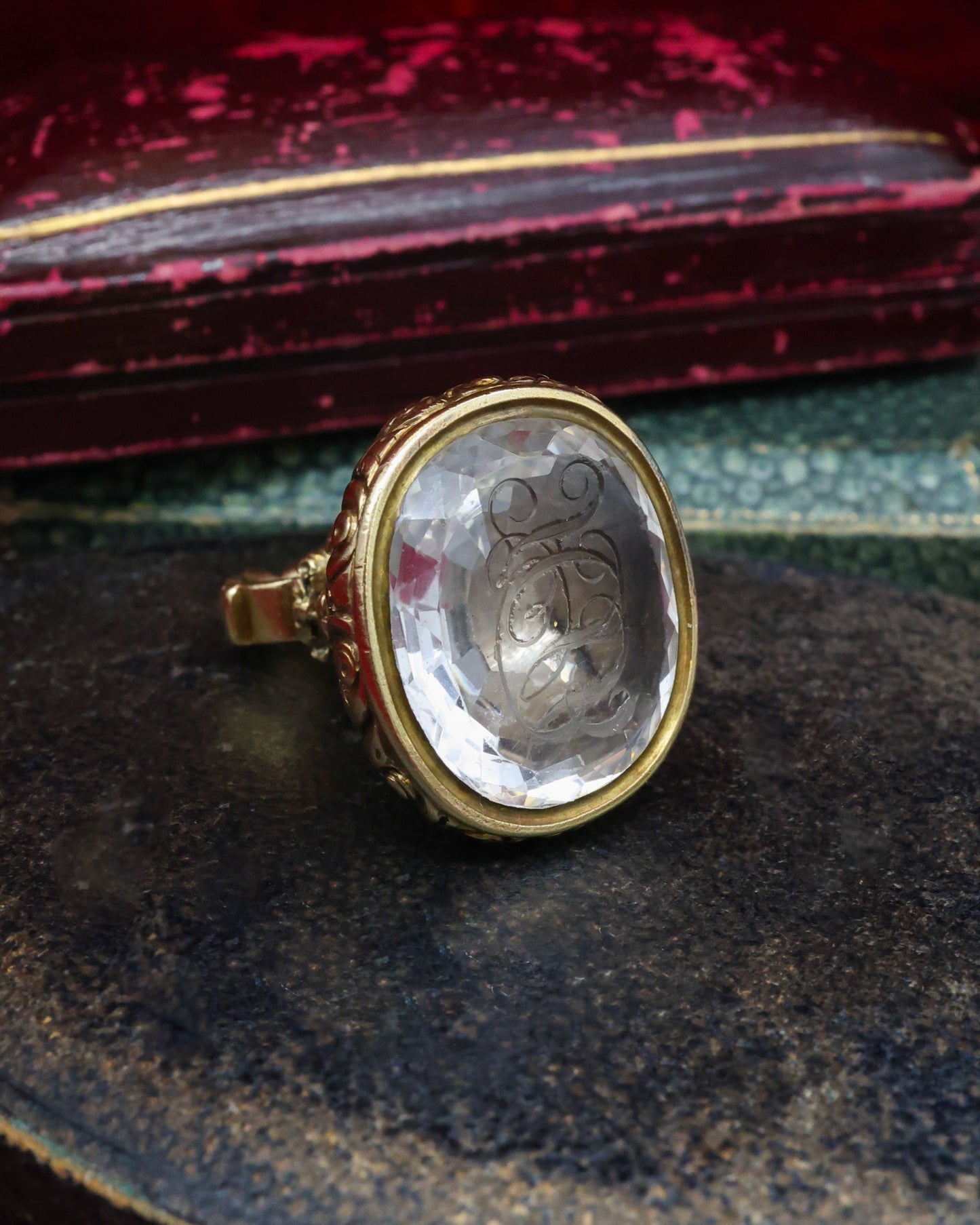 A 15 ct. (tested),Yellow Gold Seal in a detailed urn design and a Rock Crystal intaglio with facets to the edges and the initials H.J.B .  English Circa 1830