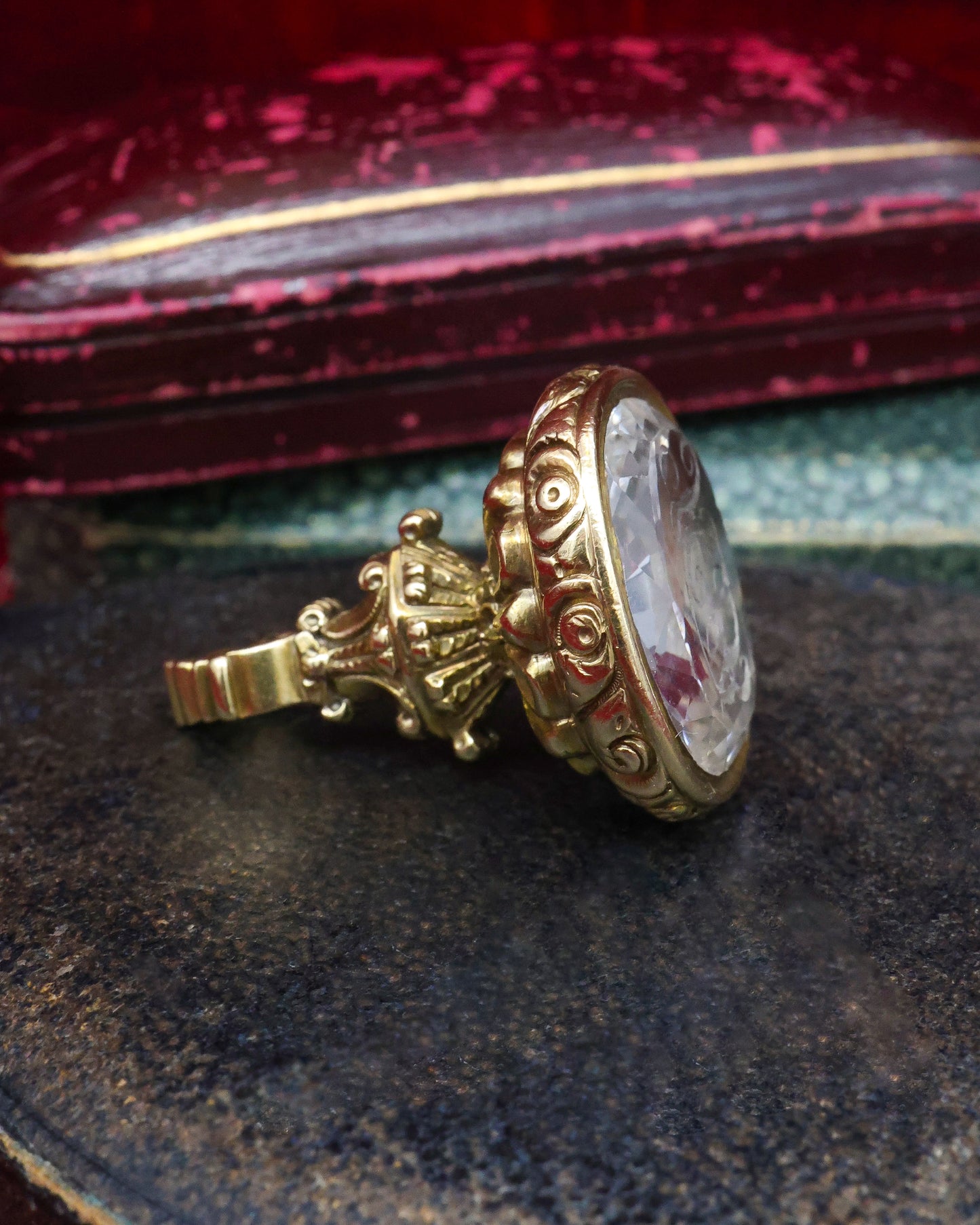 A 15 ct. (tested),Yellow Gold Seal in a detailed urn design and a Rock Crystal intaglio with facets to the edges and the initials H.J.B .  English Circa 1830