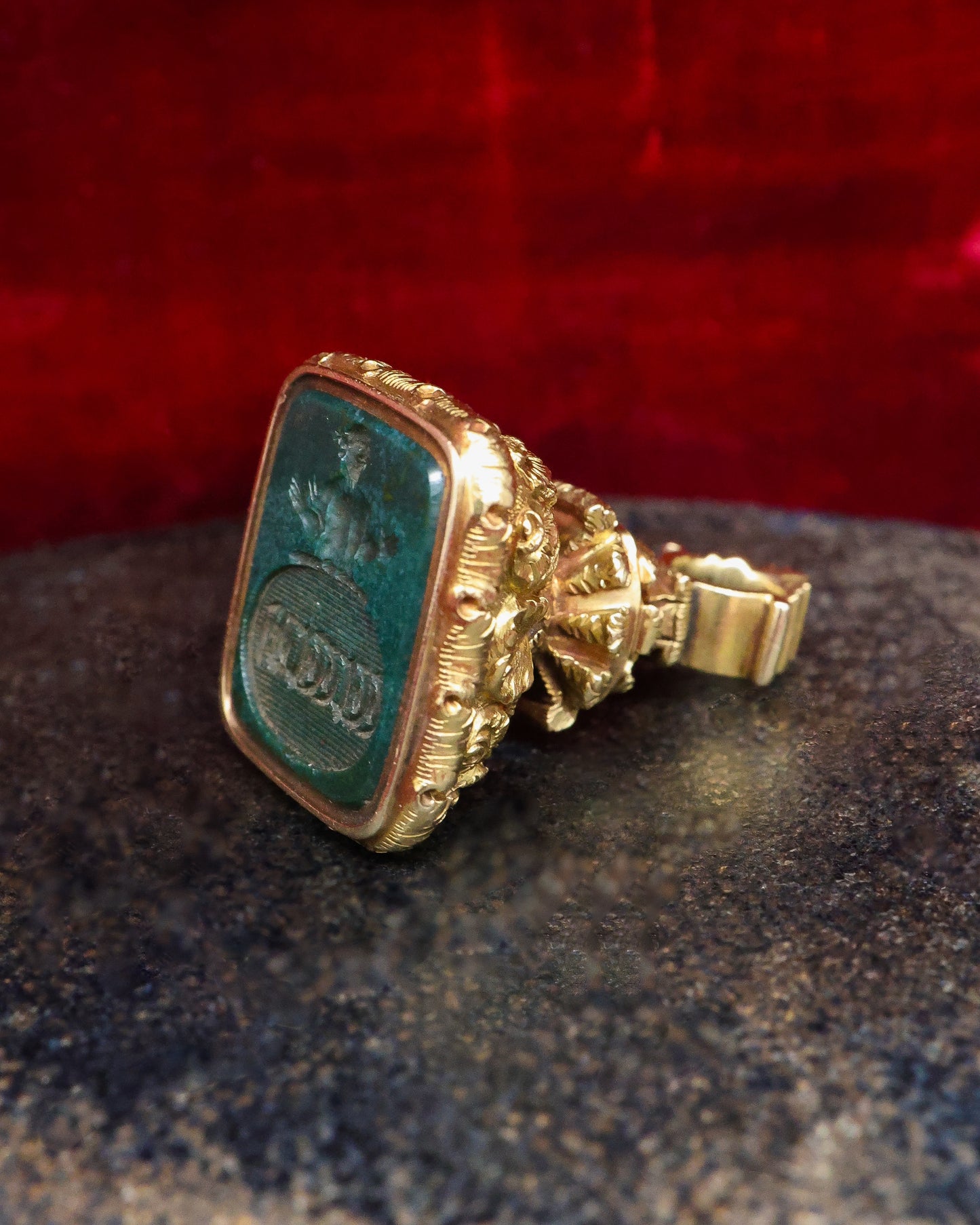 A very fine 15 ct. (tested),Yellow Gold Seal with detailed floral design and a Blood Stone intaglio with oval engraved lozenge & torso. Circa 1830