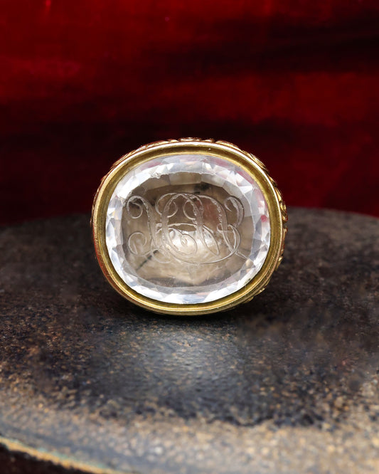 A 15 ct. (tested),Yellow Gold Seal in a detailed urn design and a Rock Crystal intaglio with facets to the edges and the initials H.J.B .  English Circa 1830