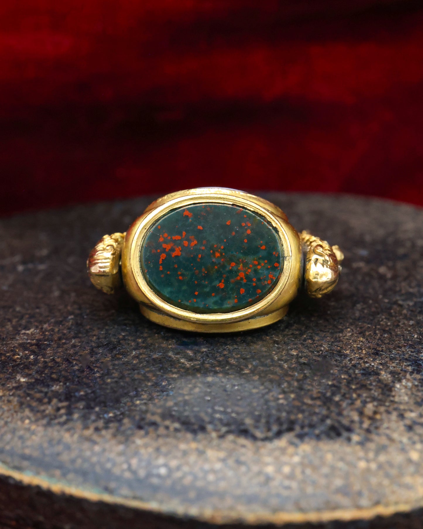 A late Georgian Pinchbeck, revolving, triple Seal, set with three oval (unmarked), Hardstones: Bloodstone, Carnelian & Carnelian with Viterous Lustre.  Circa. 1820