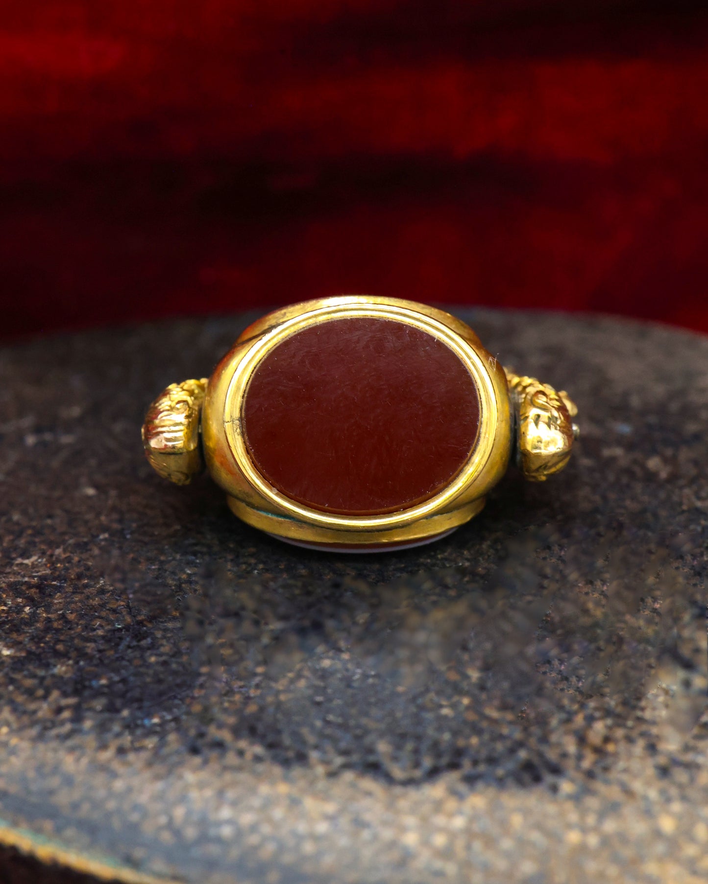 A late Georgian Pinchbeck, revolving, triple Seal, set with three oval (unmarked), Hardstones: Bloodstone, Carnelian & Carnelian with Viterous Lustre.  Circa. 1820