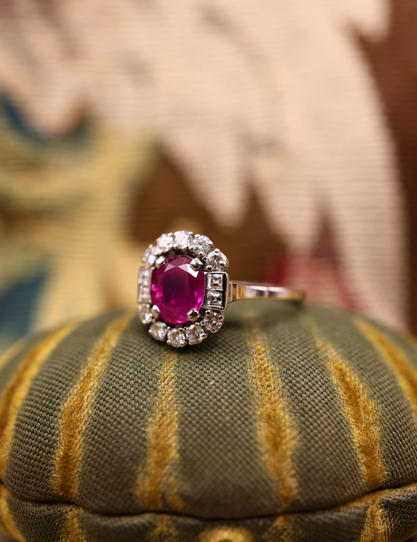 An extraordinary 2.30 Carat Natural Untreated Burmese Ruby & Diamond Cluster Ring in 18 ct. (stamped) White Gold. English, Circa 1970