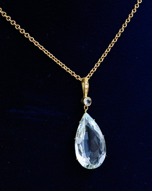 A fine 18ct. (tested), Yellow Gold  Pear Shaped Aquamarine Pendant, with Seed Pearl Bail. Circa 1905. - Robin Haydock Antique Jewellery