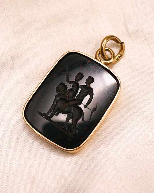 A very fine mid-18th Century, Bloodstone Erotic Intaglio, in a later 9ct English Yellow Gold Pendant Frame with articulated bail. Intaglio probably Italian, Circa 1750.