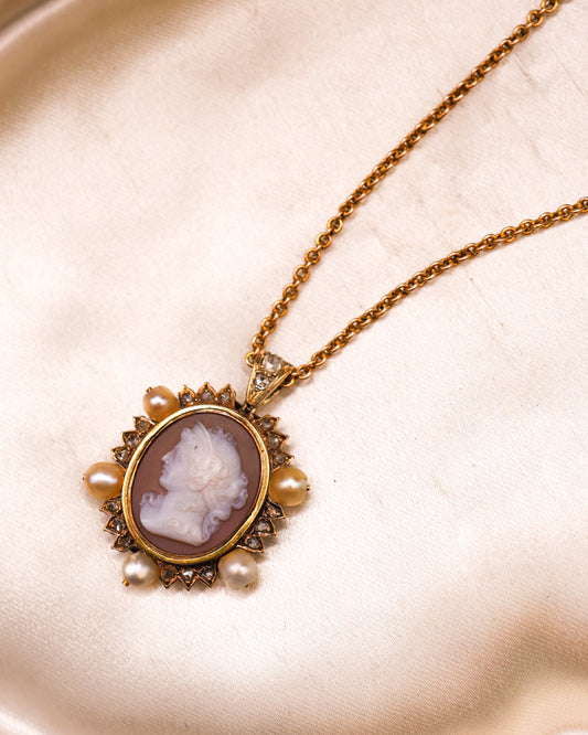A very fine Hard stone (Carnelian), Cameo Pendant surrounded by five Natural Pearls and Diamonds in 15 carat (tested), Yellow Gold. Circa 1870