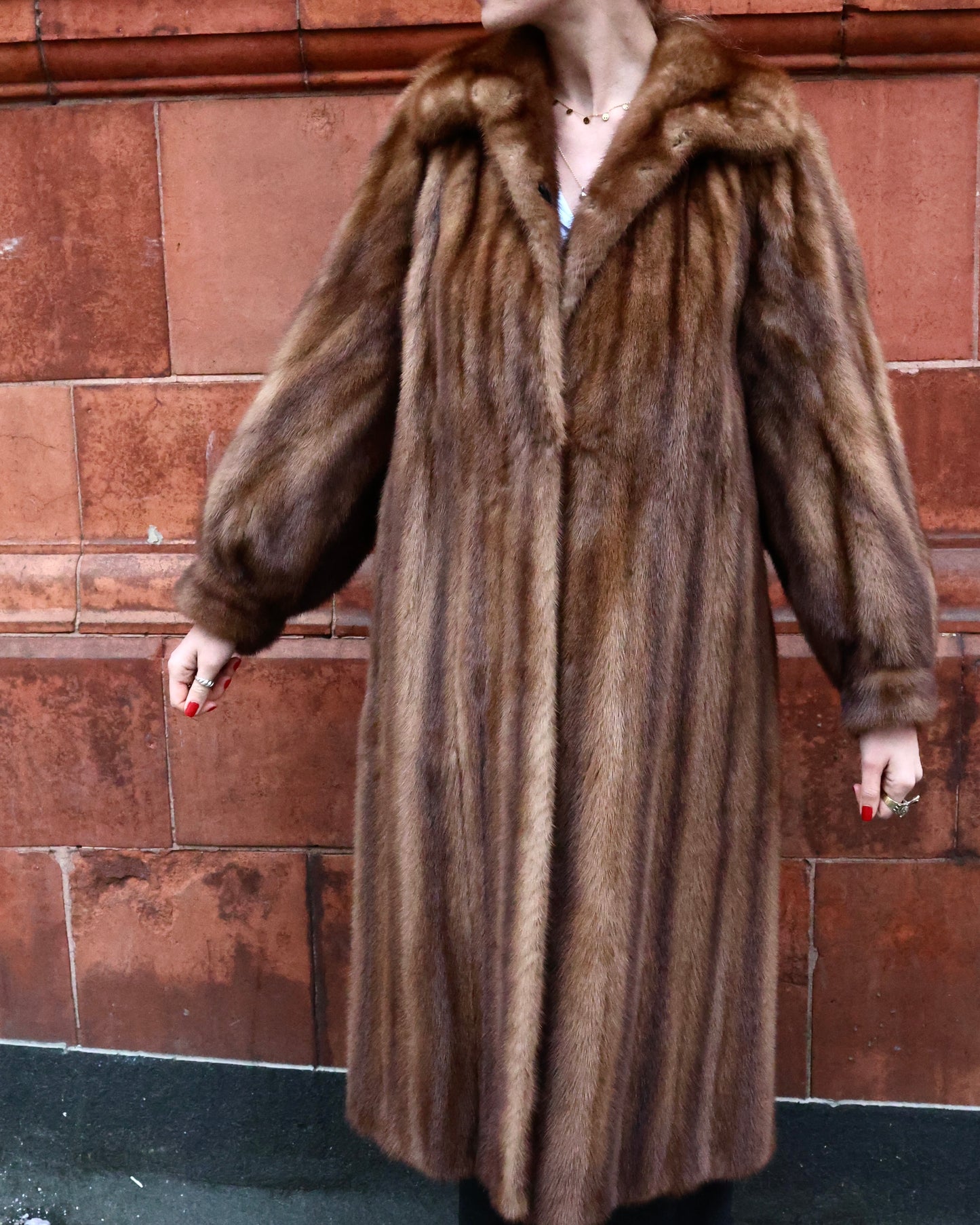 An Exceptional Full Length Demi-Buff, Fully Stranded Mink Coat with wide Raglan Sleeves, tapering to Mandarin Cuffs and a generous Swing Back. Hand made by Lawrence's of Southport. Circa 1990