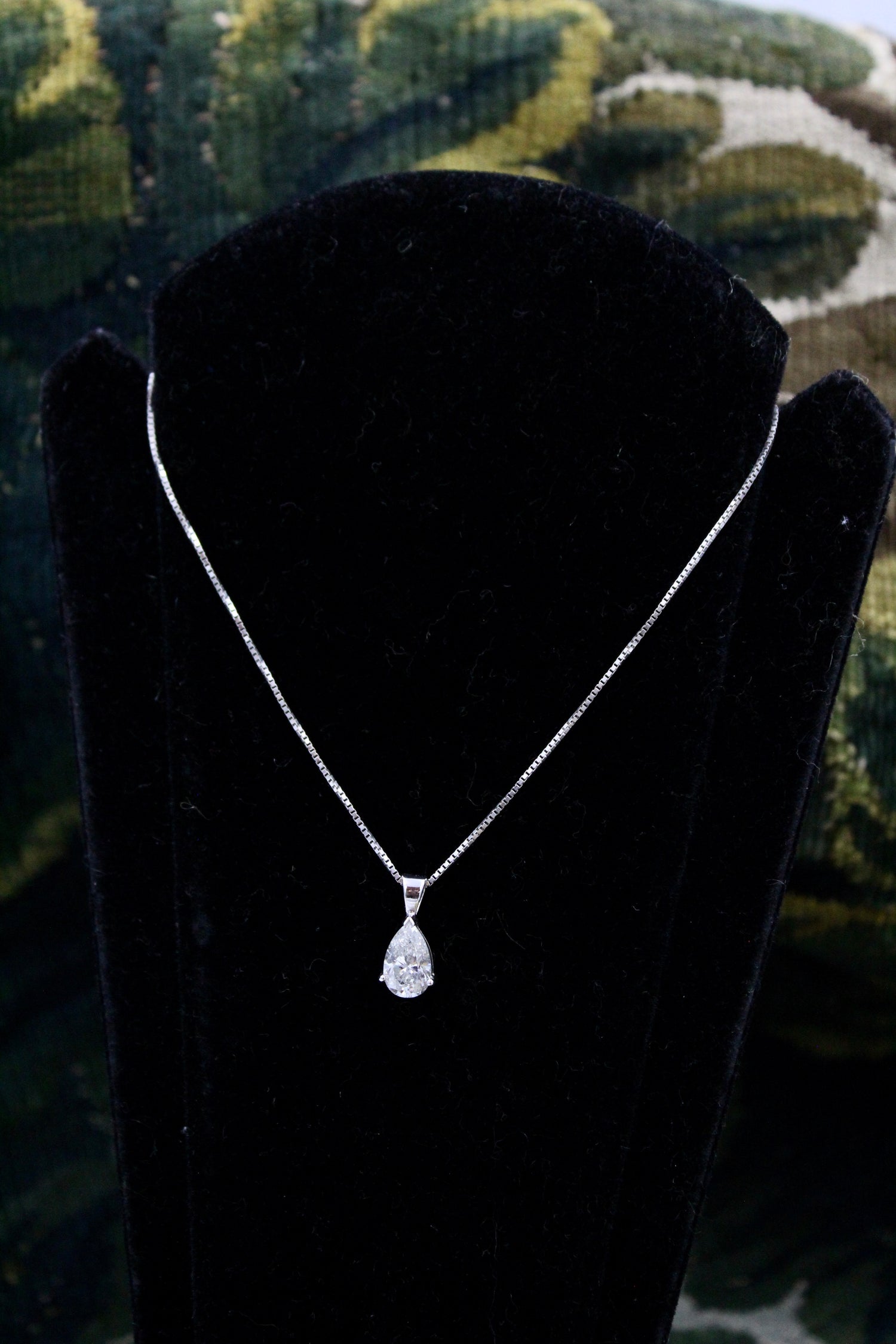 A very fine Pear Shaped  Diamond Pendant, independently assessed as being of 1.81 Carats (weighed), G Colour and SI Clarity, on an 18 Carat (marked) White Gold Chain. - Robin Haydock Antiques
