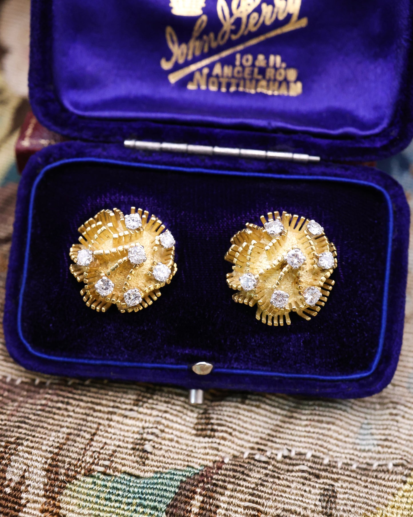 A fine pair of 18ct Yellow Gold (tested), Domed and Abstract Diamond set (14 in total), Earrings, with post and butterfly fittings. Circa 1970