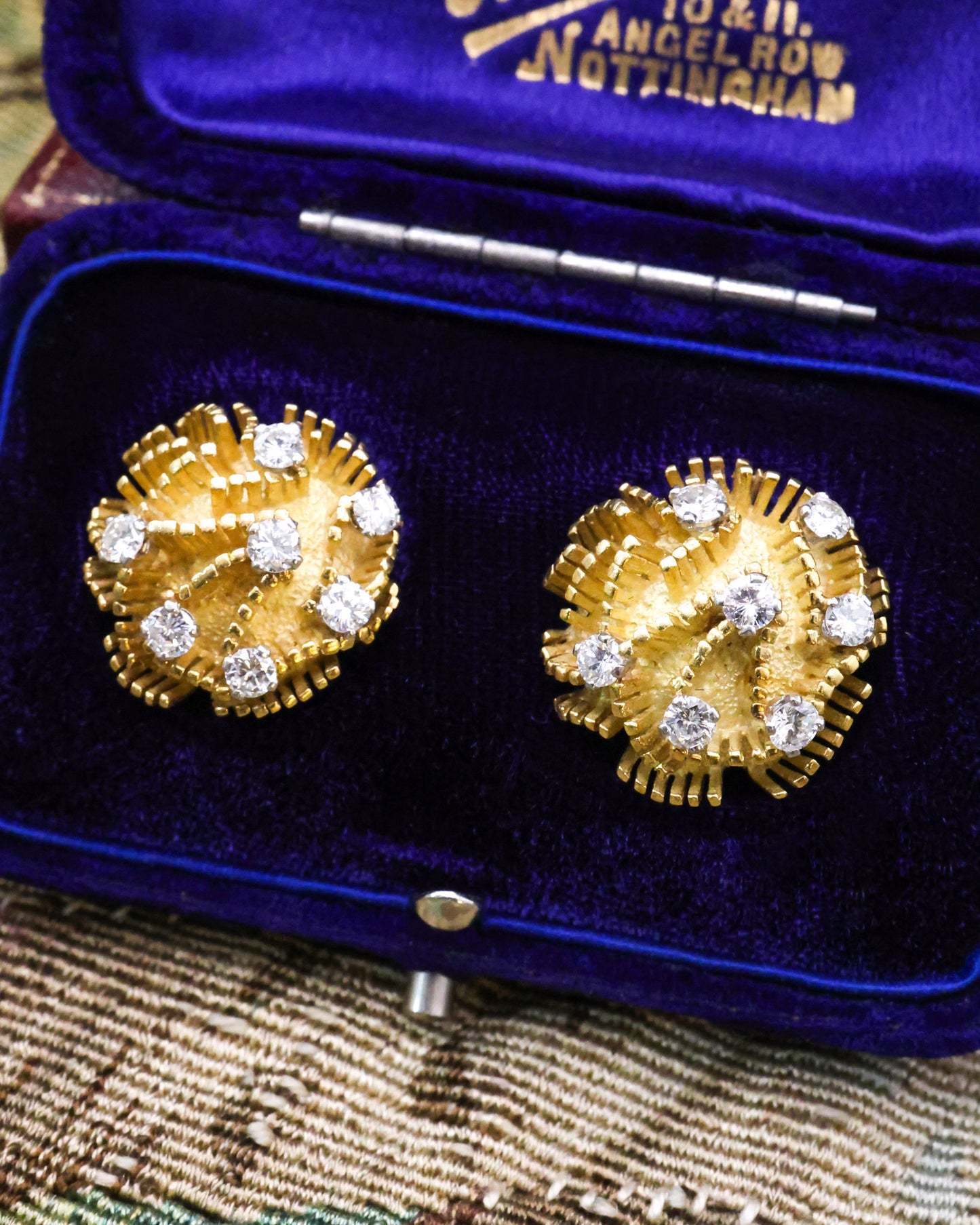A fine pair of 18ct Yellow Gold (tested), Domed and Abstract Diamond set (14 in total), Earrings, with post and butterfly fittings. Circa 1970