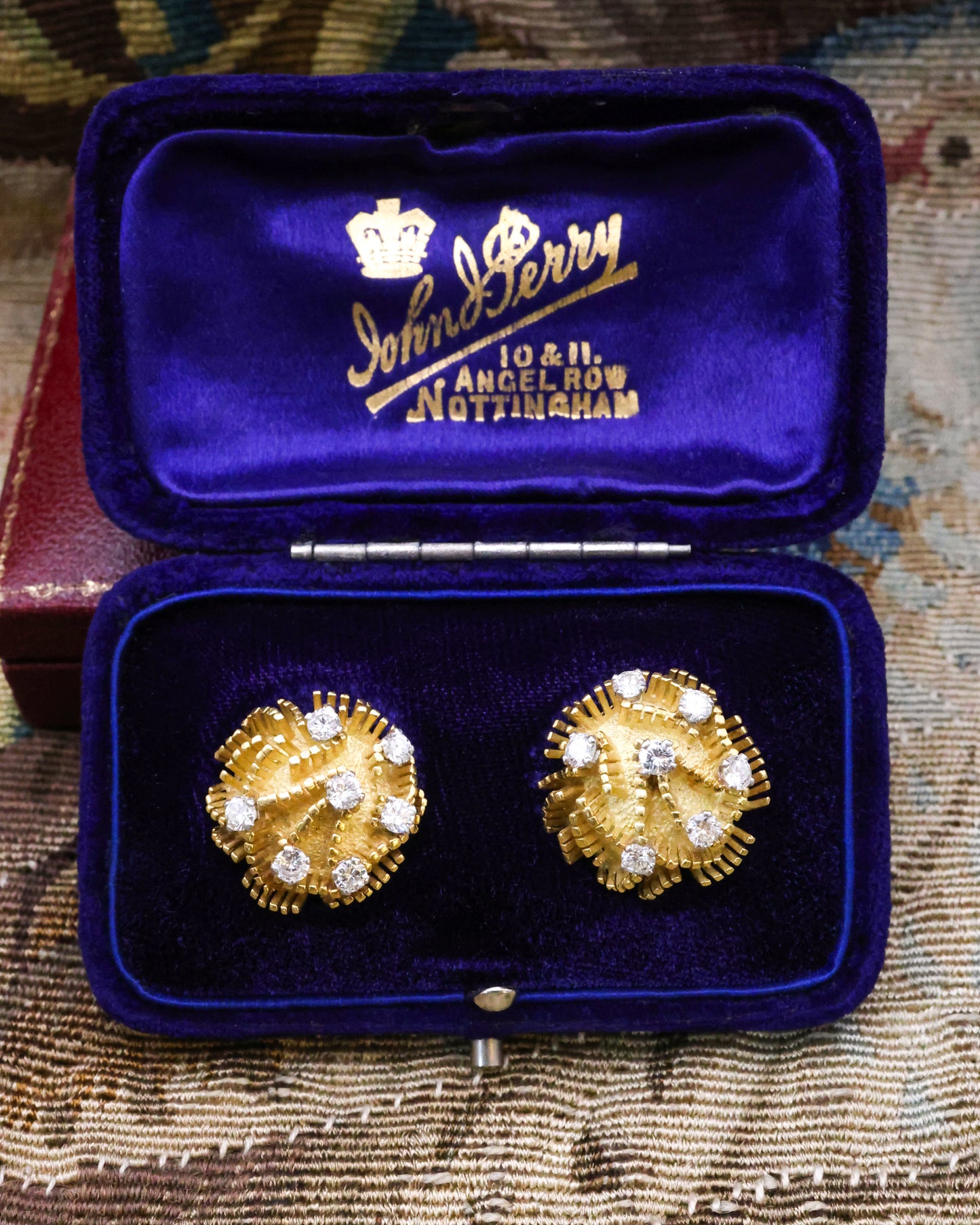 A fine pair of 18ct Yellow Gold (tested), Domed and Abstract Diamond set (14 in total), Earrings, with post and butterfly fittings. Circa 1970