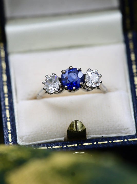 A very beautiful 1.45 Carat Natural Ceylon Sapphire and (two) Old Mine Cut Diamond & Platinum Engagement Ring. Circa 1930 - Robin Haydock Antiques