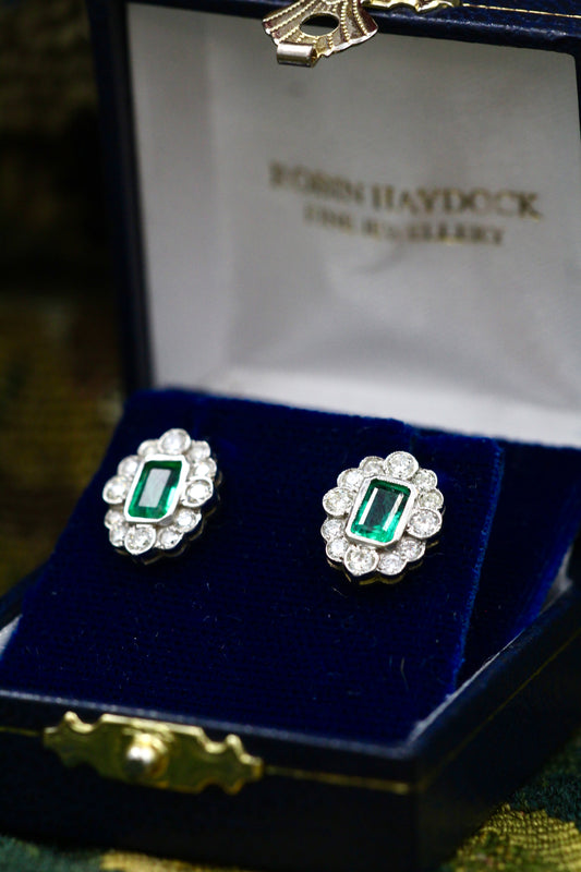 A fine pair of Oval Emerald & Diamond, 18 ct White & Yellow Gold (stamped 750) Cluster Earrings. Pre-owned - Robin Haydock Antiques