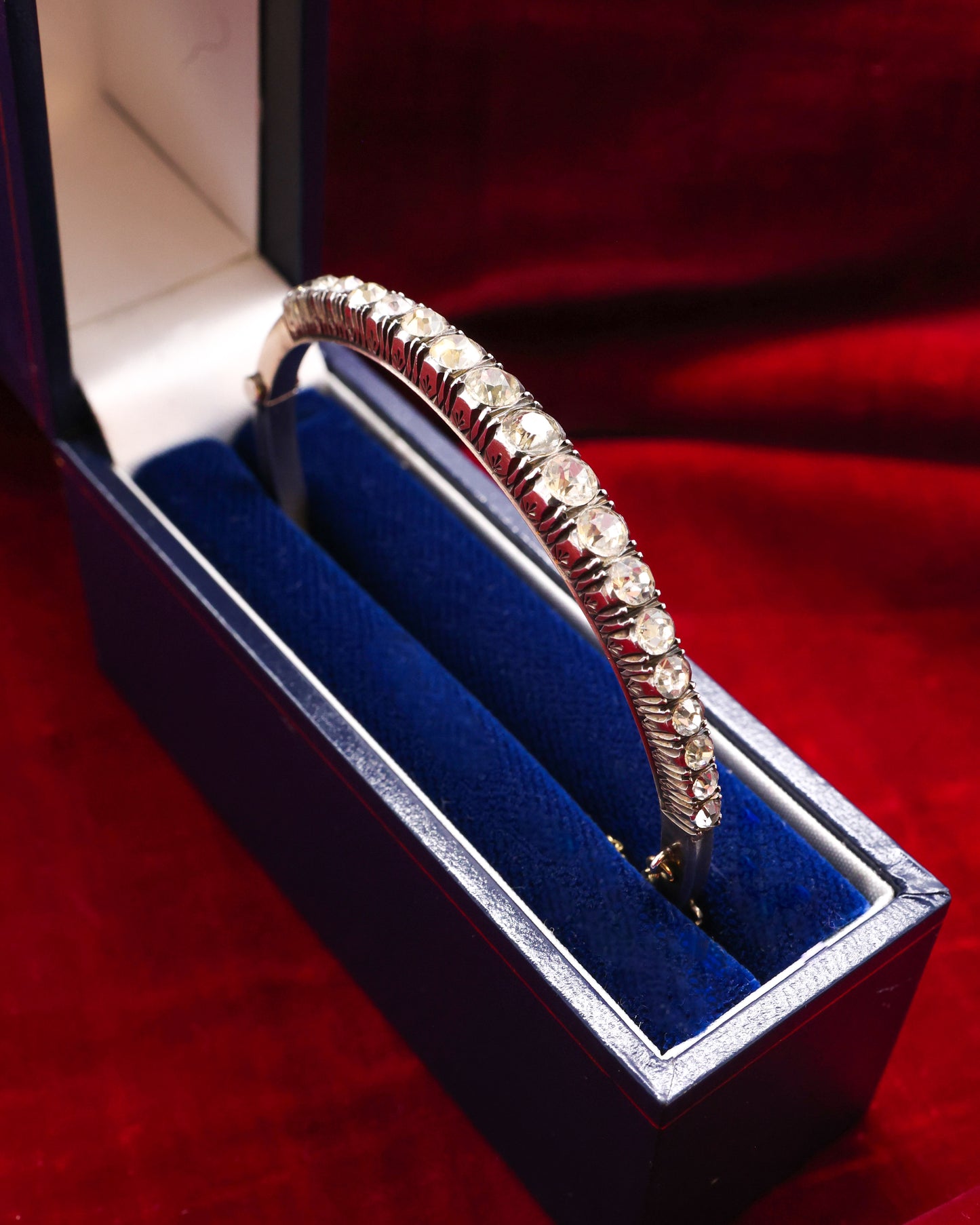 A very fine Silver (tested European Grade), Graduated, Paste, Half Hinged Bangle. Circa 1890. Continental.