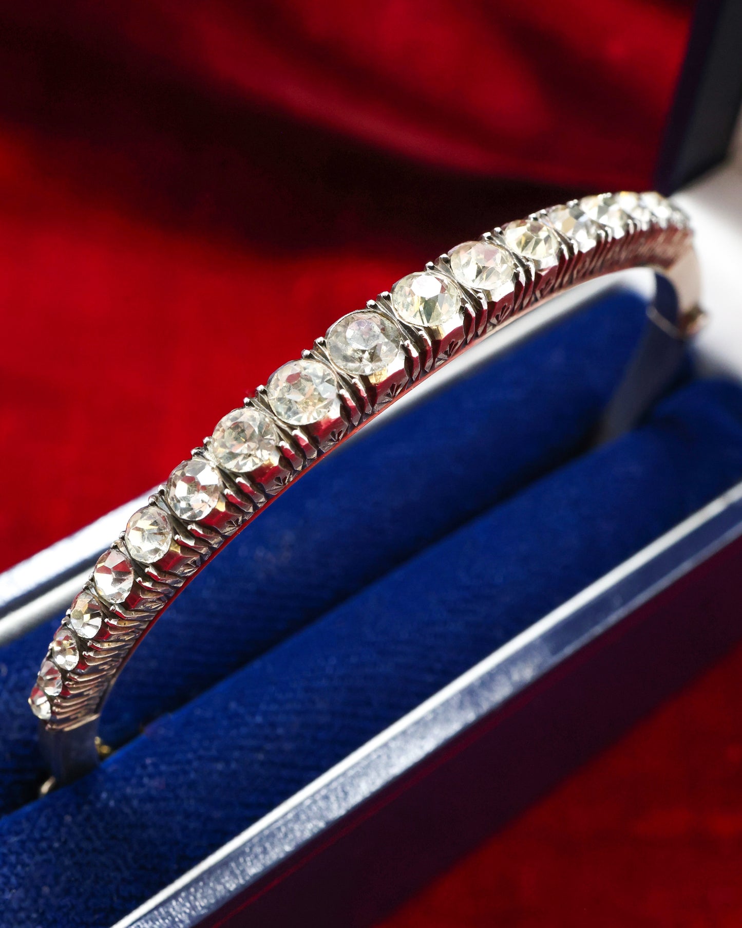 A very fine Silver (tested European Grade), Graduated, Paste, Half Hinged Bangle. Circa 1890. Continental.