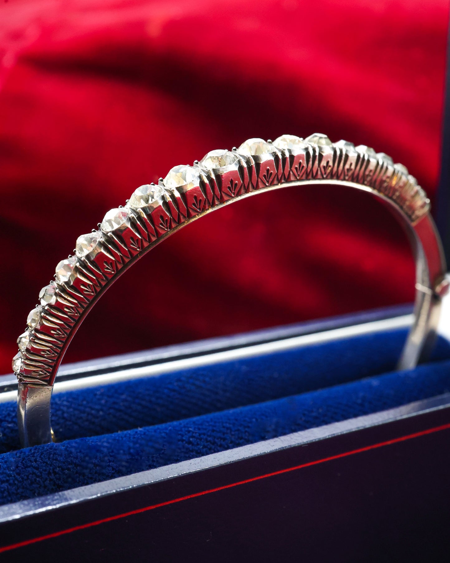 A very fine Silver (tested European Grade), Graduated, Paste, Half Hinged Bangle. Circa 1890. Continental.
