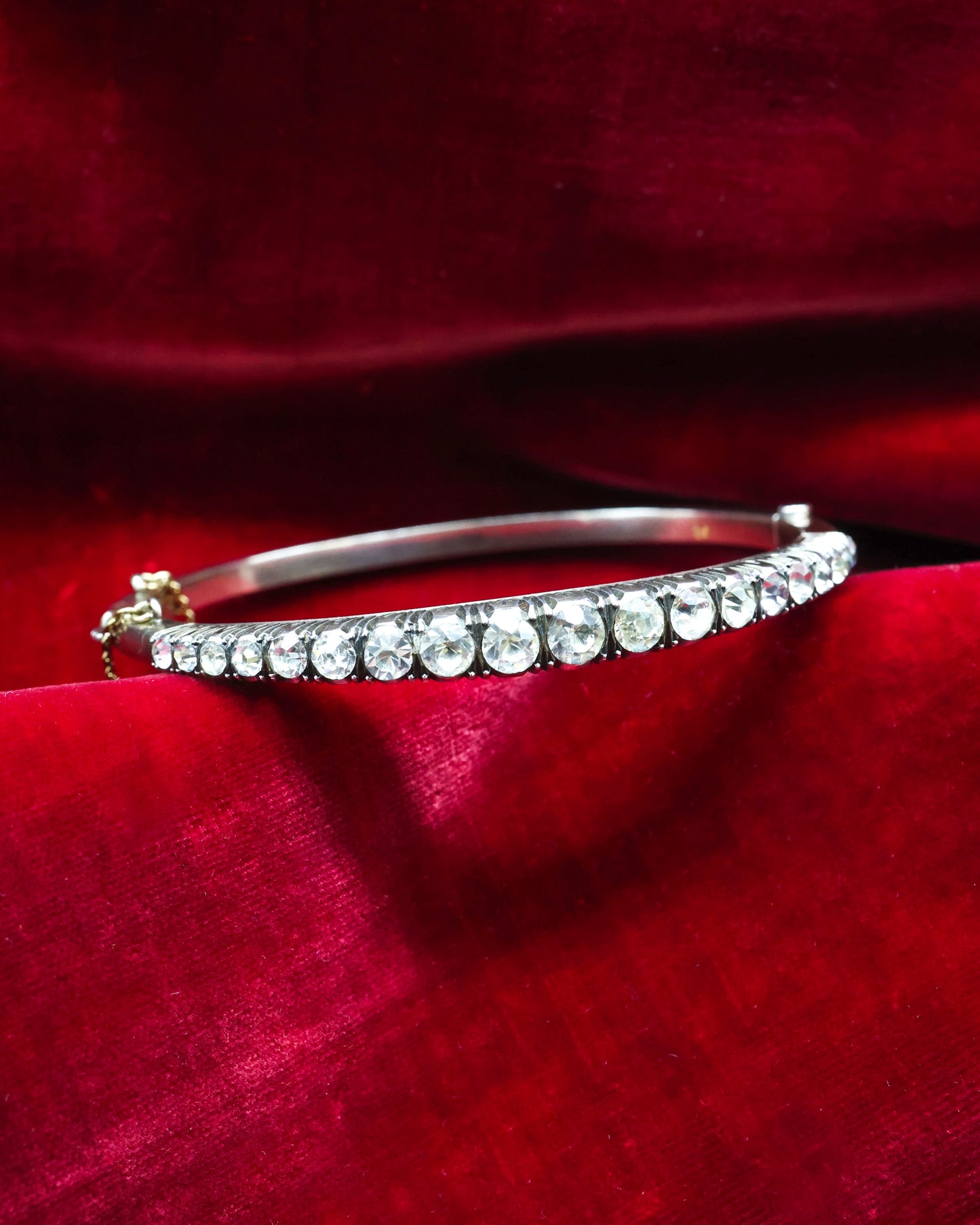 A very fine Silver (tested European Grade), Graduated, Paste, Half Hinged Bangle. Circa 1890. Continental.