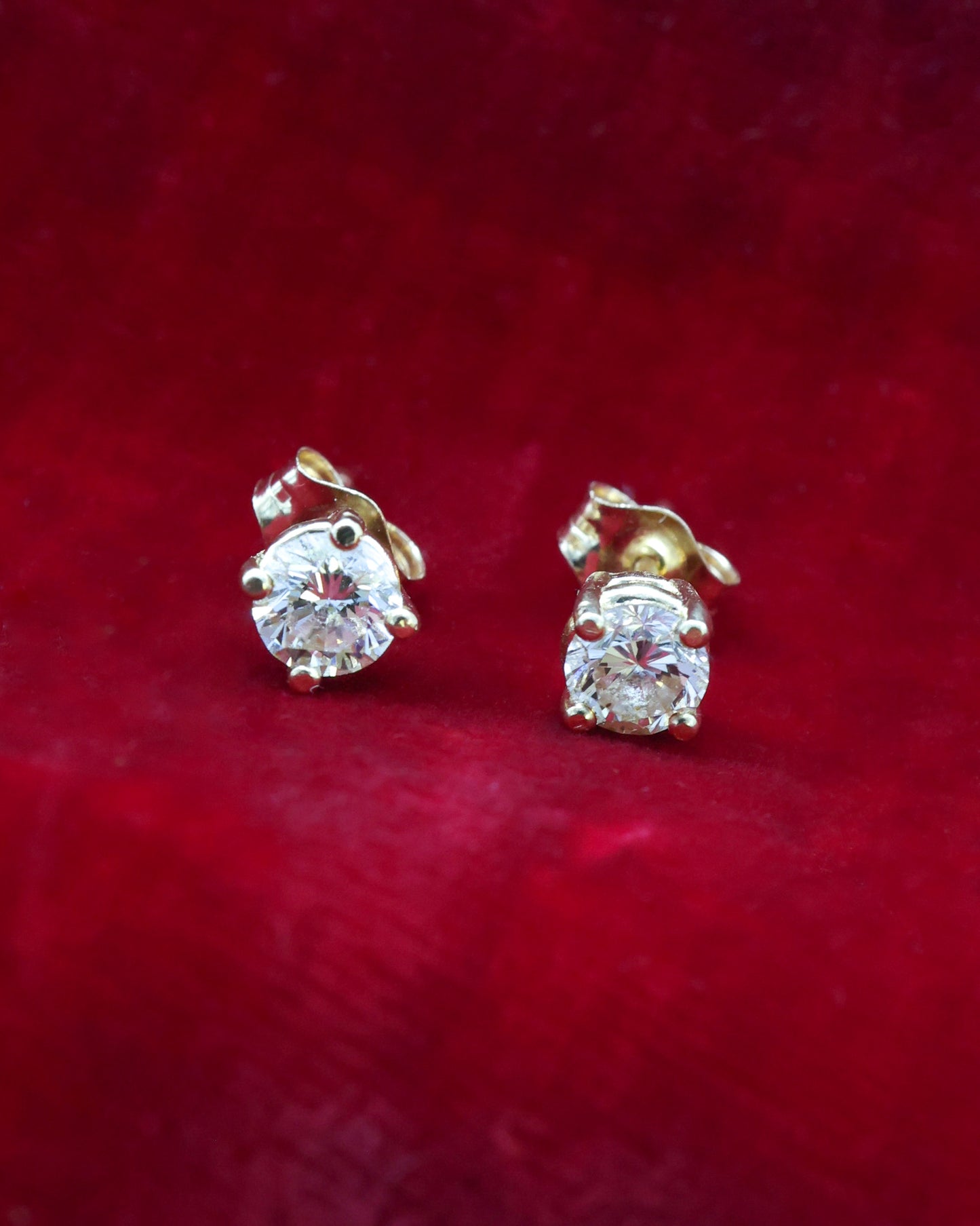 A fine pair of 14 carat Yellow Gold, Diamond Stud Earrings, Preowned.
