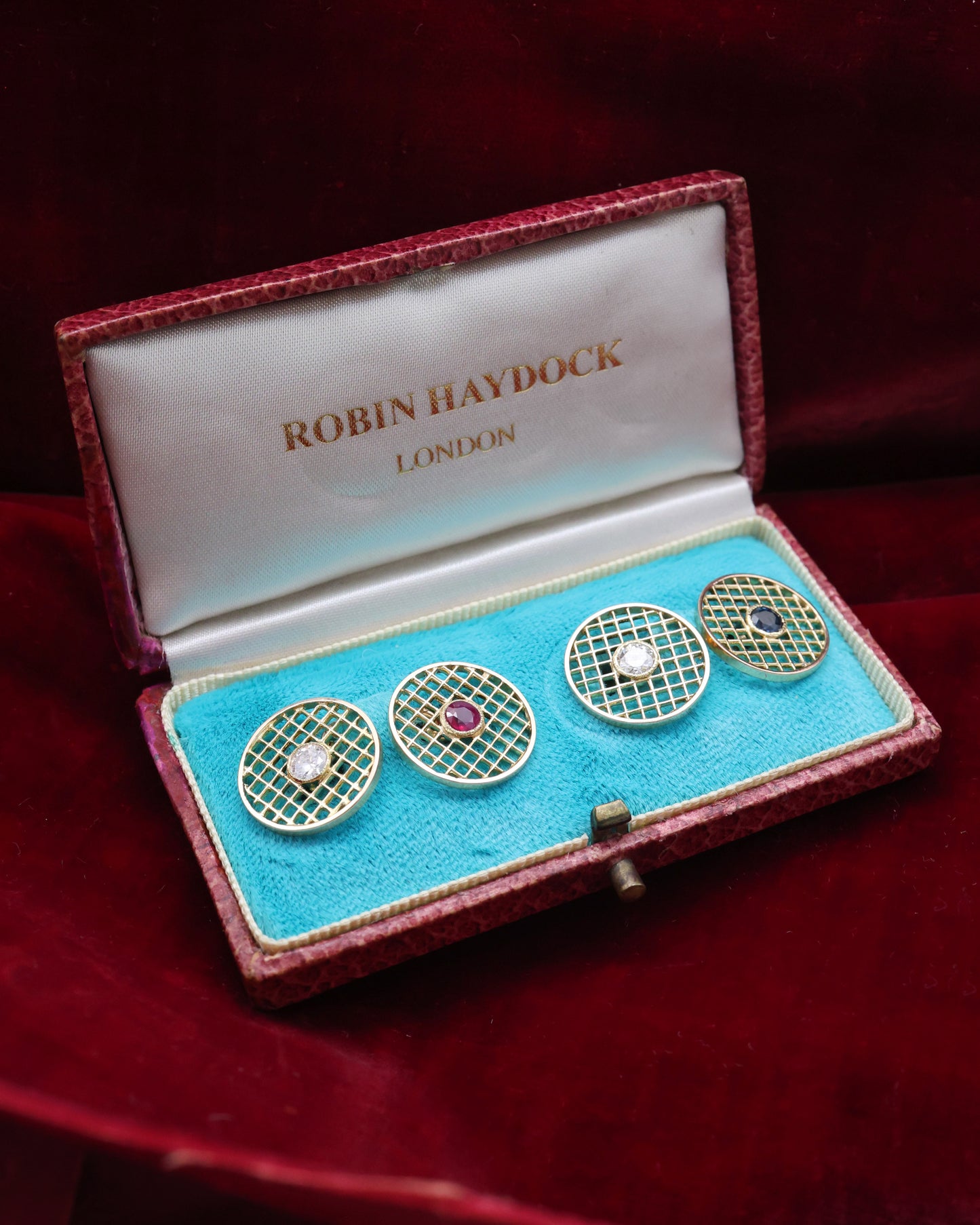 A fine pair of 18 ct. Yellow Gold (tested), Ruby, Sapphire & Diamond Cuff Links. Circa 1960