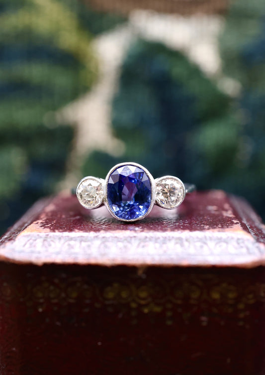 A very fine 18 ct.  White Gold & Platinum Oval 2.40ct Sapphire & Diamond Three Stone Ring. Circa 1935 - Robin Haydock Antiques