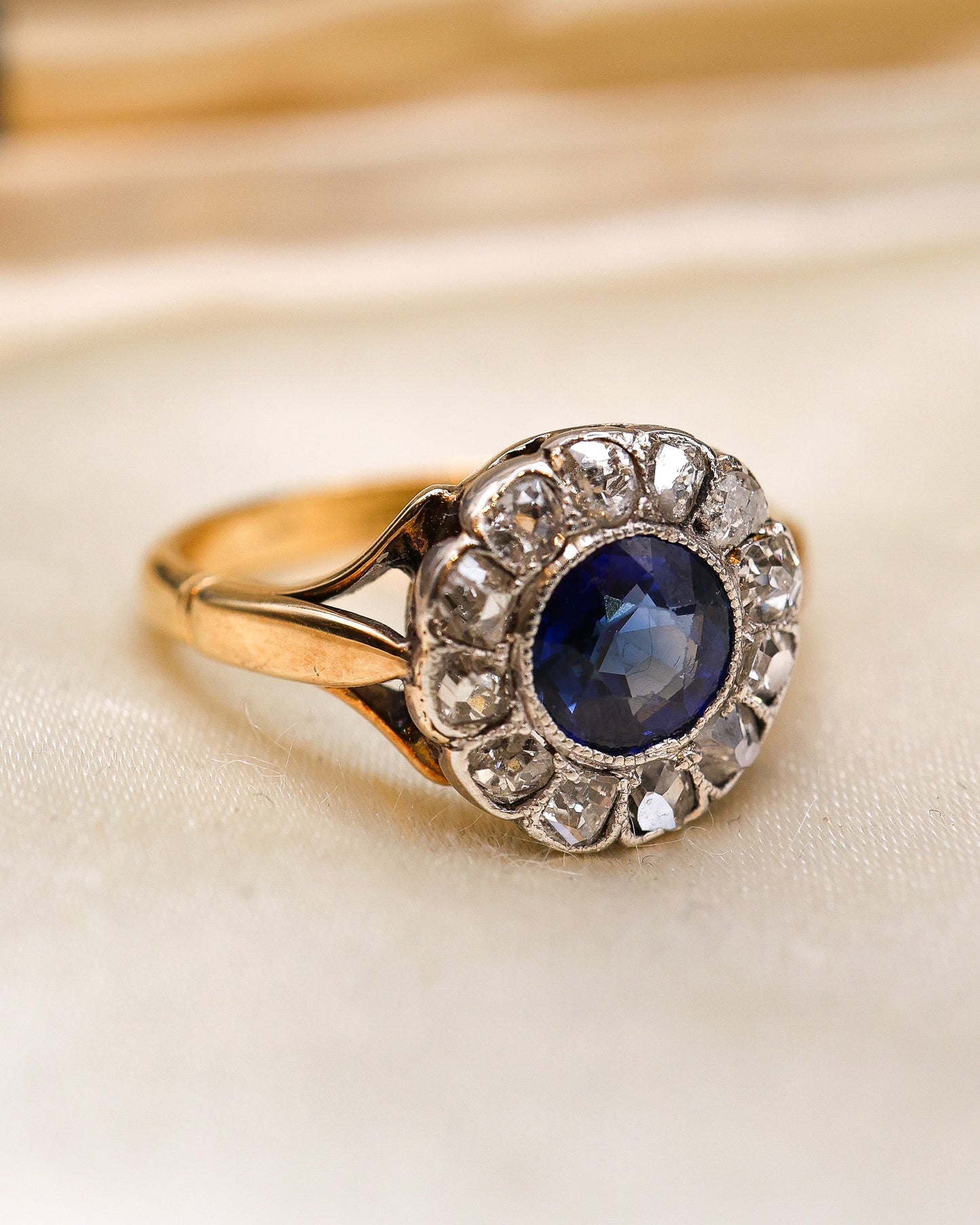 A fine 18ct Yellow Gold & Platinum (stamped),Sapphire and Diamond Cluster Ring Circa 1920-1930