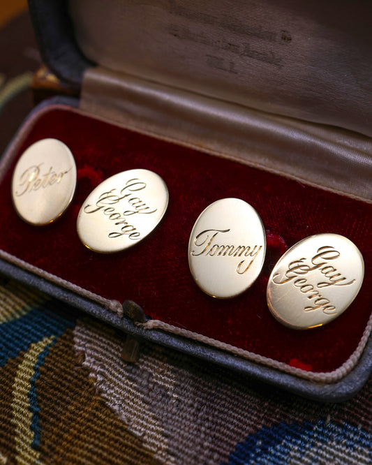 A fine pair of 18ct Yellow Gold Cuff Links, engraved "Gay George" & "Tommy" to one, and "Gay George" & "Peter" to the other. London Marks 1981. by Ramsden & Roed Ltd. Prov: Her Grace the late Duchess of Devonshire.