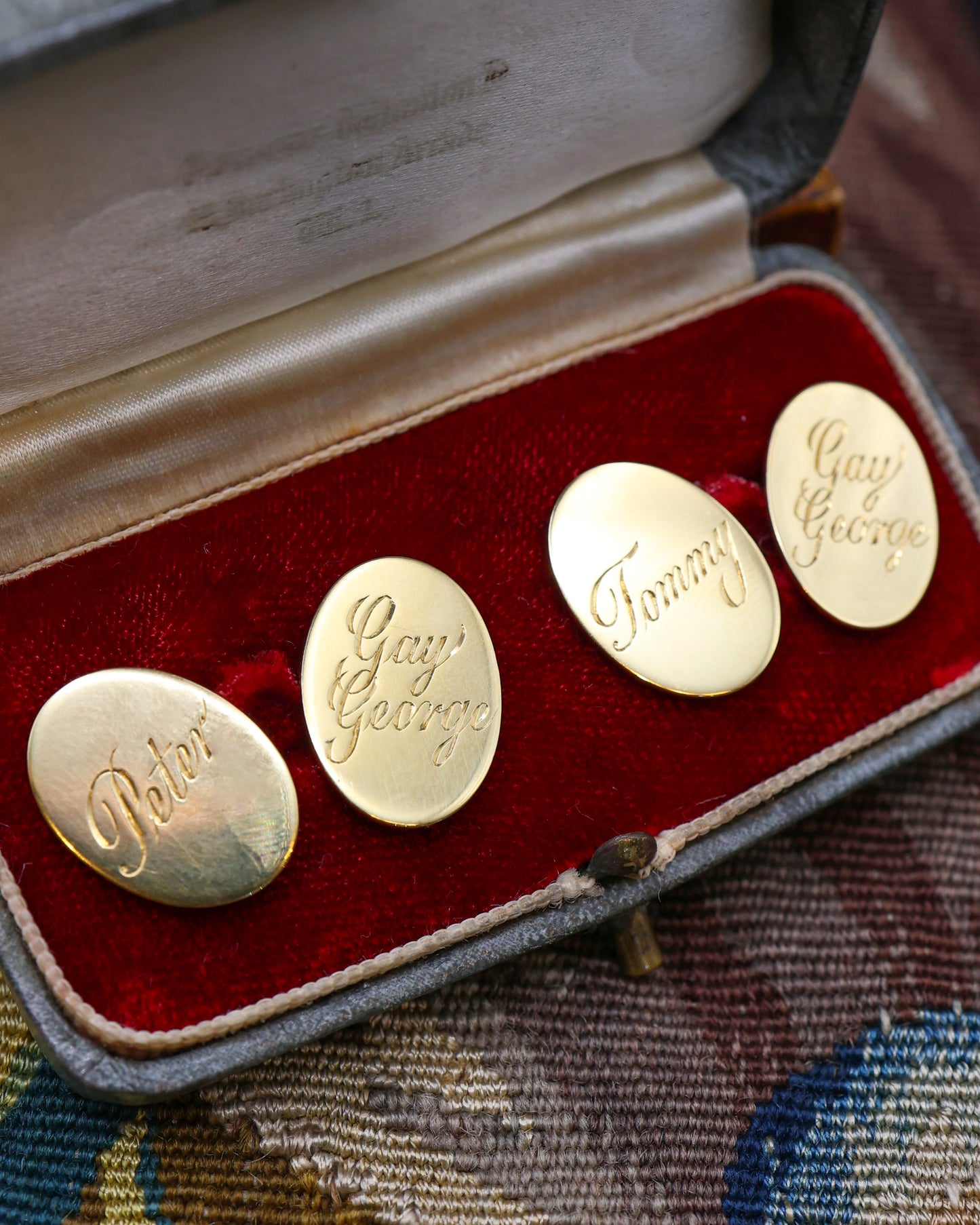 A fine pair of 18ct Yellow Gold Cuff Links, engraved "Gay George" & "Tommy" to one, and "Gay George" & "Peter" to the other. London Marks 1981. by Ramsden & Roed Ltd. Prov: Her Grace the late Duchess of Devonshire.